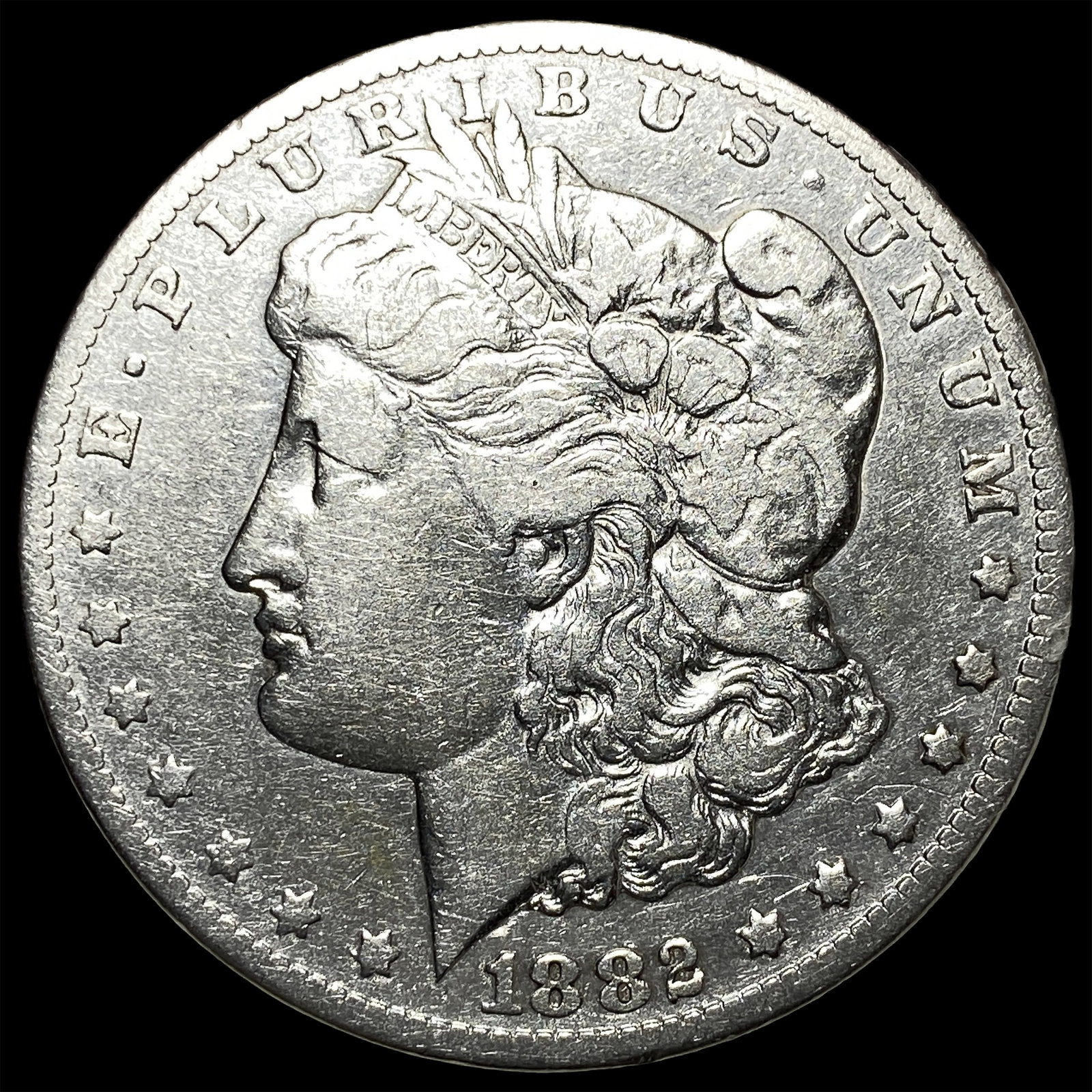 1882-CC Silver Morgan Dollar ABOUT UNCIRCULATED: 1882-CC Silver Morgan Dollar ABOUT UNCIRCULATED
