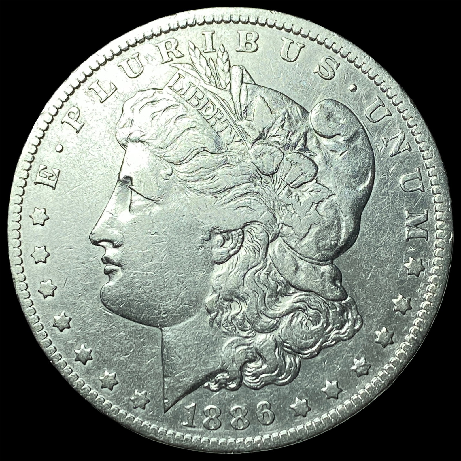 1886-O Silver Morgan Dollar NEARLY UNCIRCULATED: 1886-O Silver Morgan Dollar NEARLY UNCIRCULATED