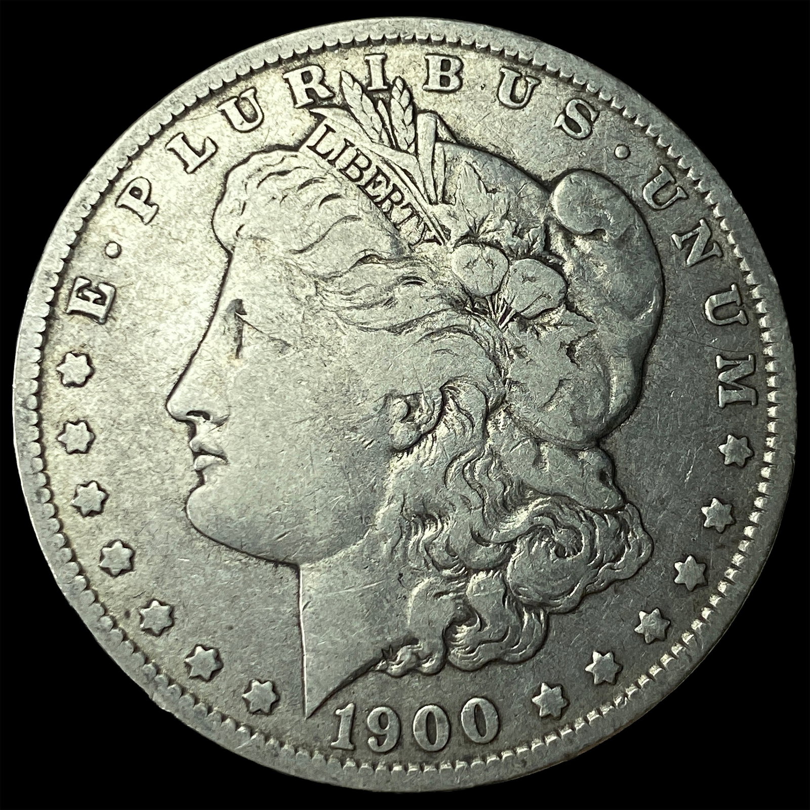 1900-O Silver Morgan Dollar ABOUT UNCIRCULATED