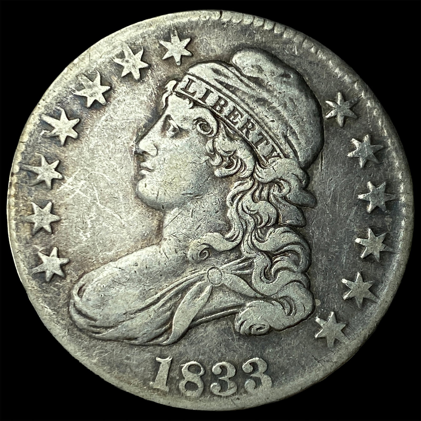 1833 Capped Bust Half Dollar NEARLY UNCIRCULATED