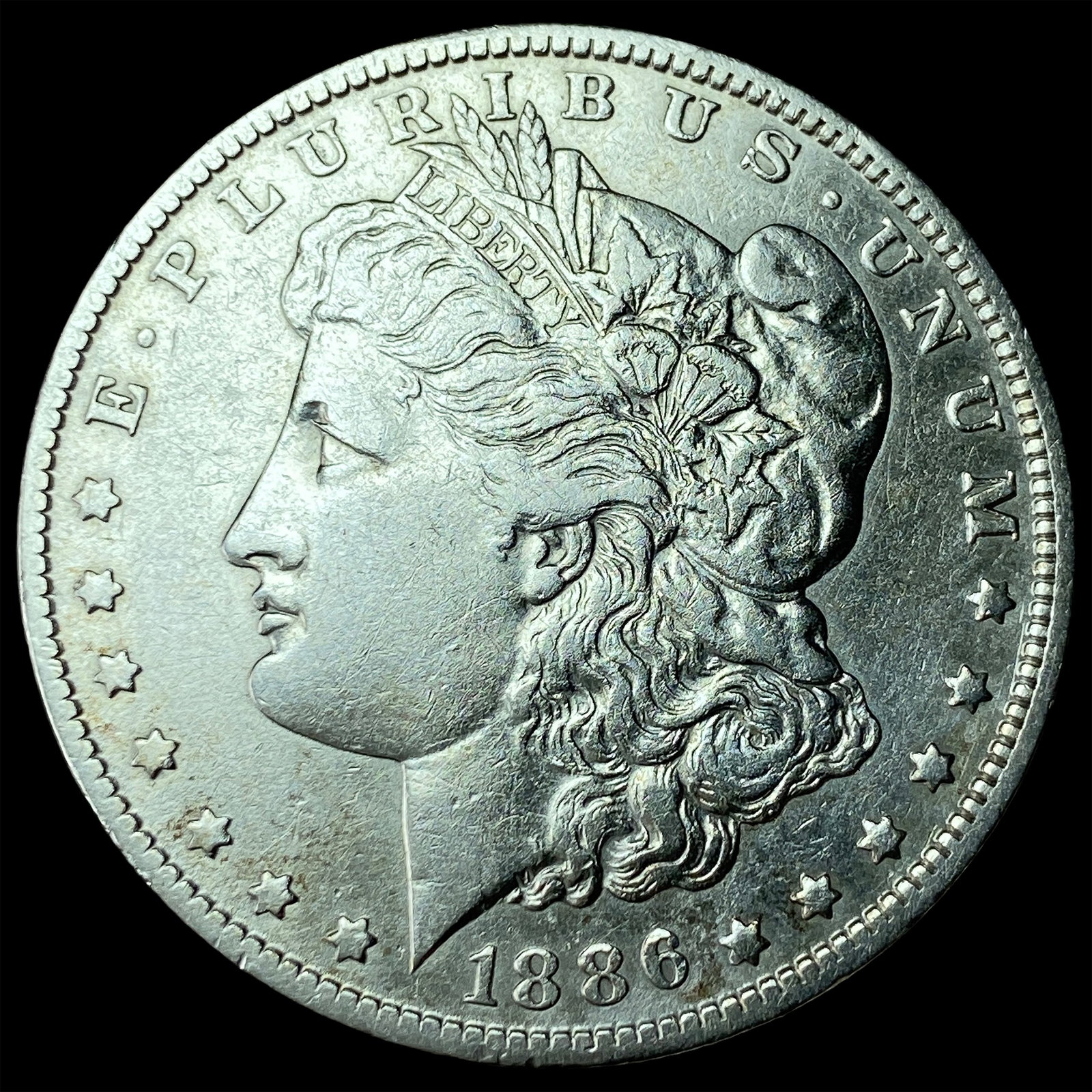 1886-O Silver Morgan Dollar CLOSELY UNCIRCULATED: 1886-O Silver Morgan Dollar CLOSELY UNCIRCULATED