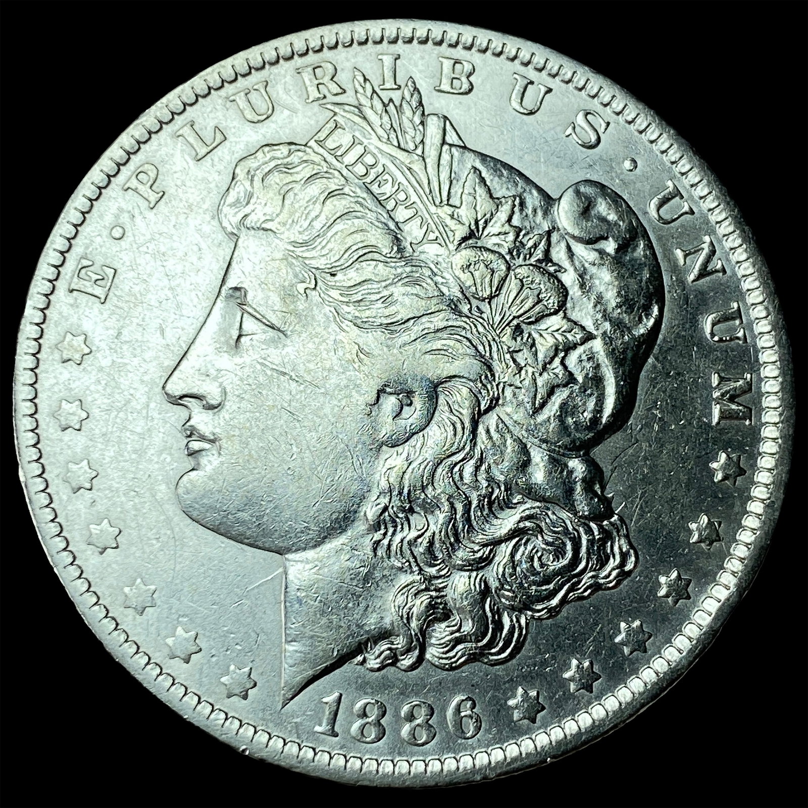 1886-O Silver Morgan Dollar CLOSELY UNCIRCULATED: 1886-O Silver Morgan Dollar CLOSELY UNCIRCULATED
