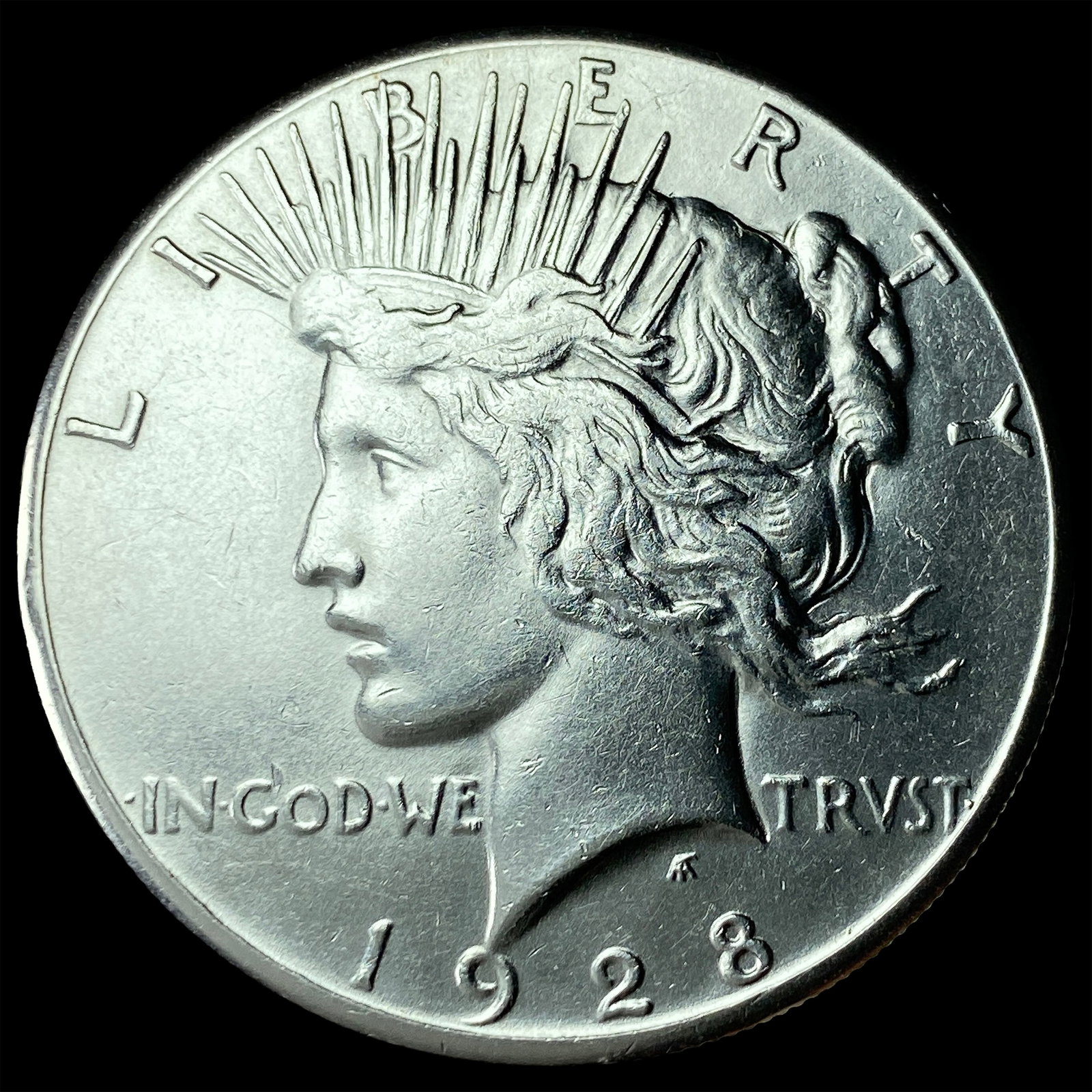 1928 Silver Peace Dollar CLOSELY UNCIRCULATED (1 of 2)