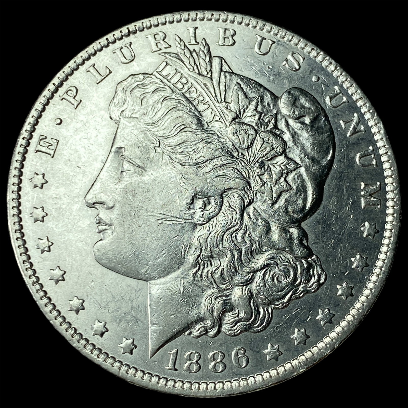 1886-O Silver Morgan Dollar CLOSELY UNCIRCULATED: 1886-O Silver Morgan Dollar CLOSELY UNCIRCULATED
