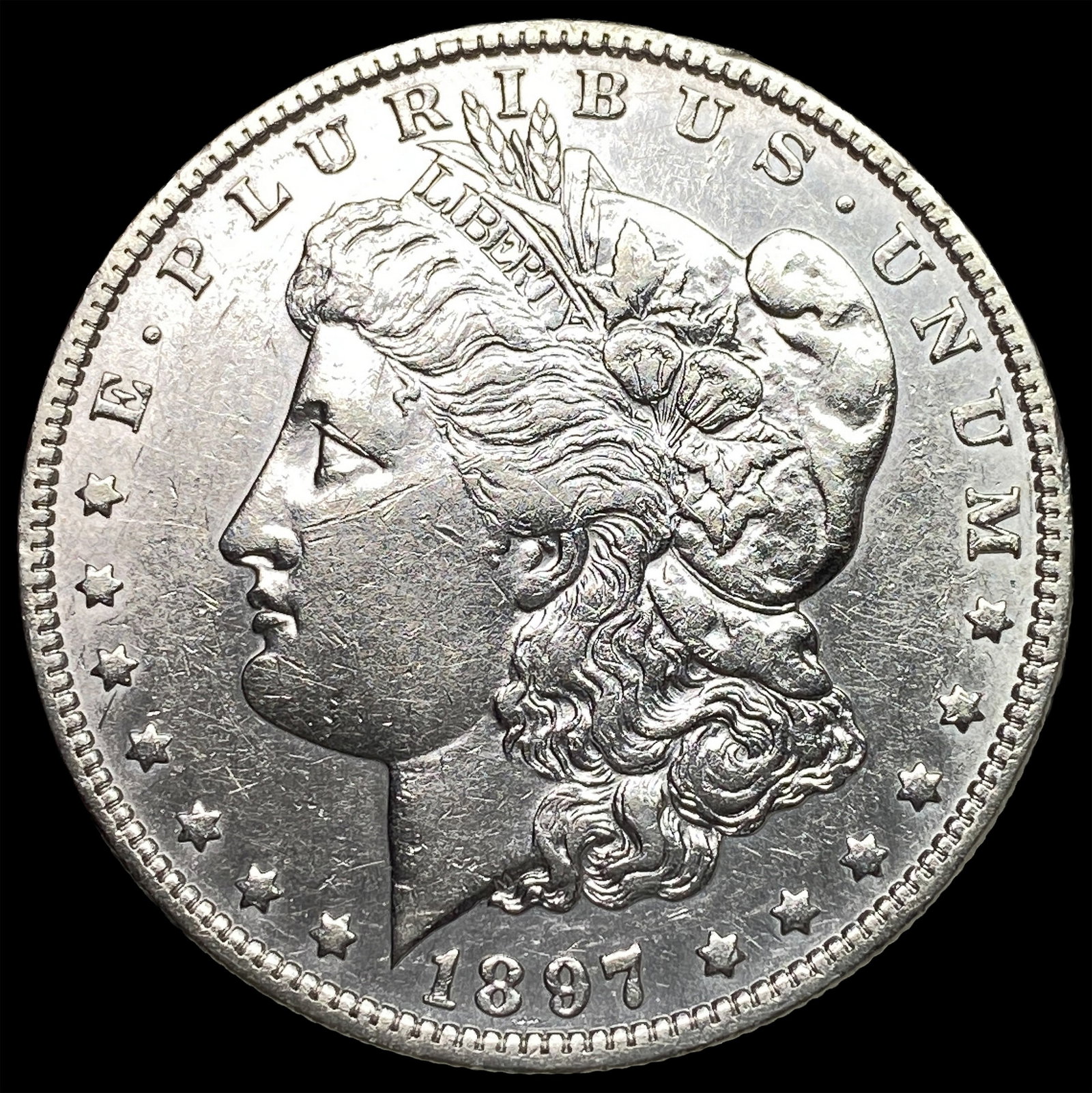 1897-O Silver Morgan Dollar CLOSELY UNCIRCULATED: 1897-O Silver Morgan Dollar CLOSELY UNCIRCULATED