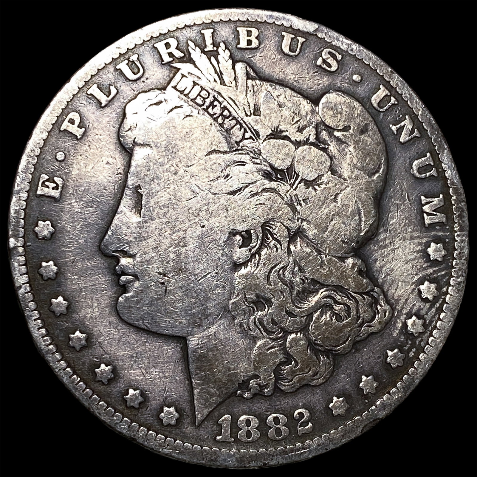1882-CC Silver Morgan Dollar ABOUT UNCIRCULATED: 1882-CC Silver Morgan Dollar ABOUT UNCIRCULATED