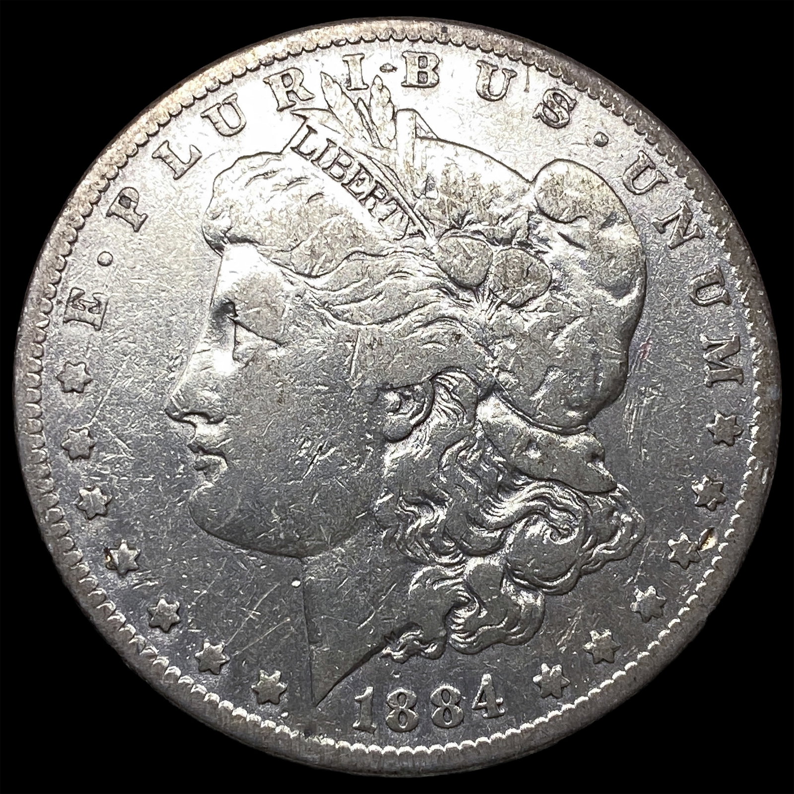 1884-S Silver Morgan Dollar ABOUT UNCIRCULATED: 1884-S Silver Morgan Dollar ABOUT UNCIRCULATED