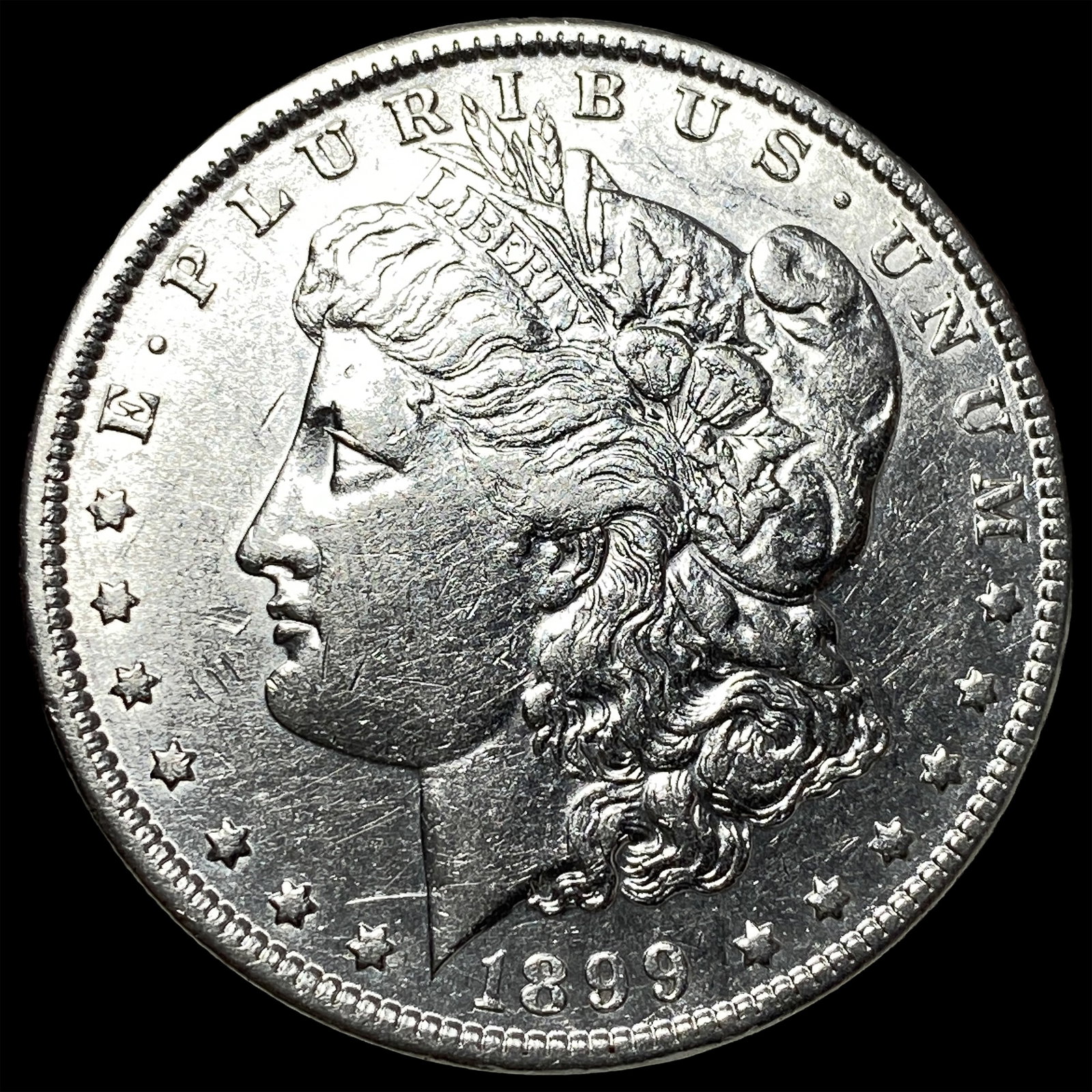 1899-O Silver Morgan Dollar CLOSELY UNCIRCULATED: 1899-O Silver Morgan Dollar CLOSELY UNCIRCULATED