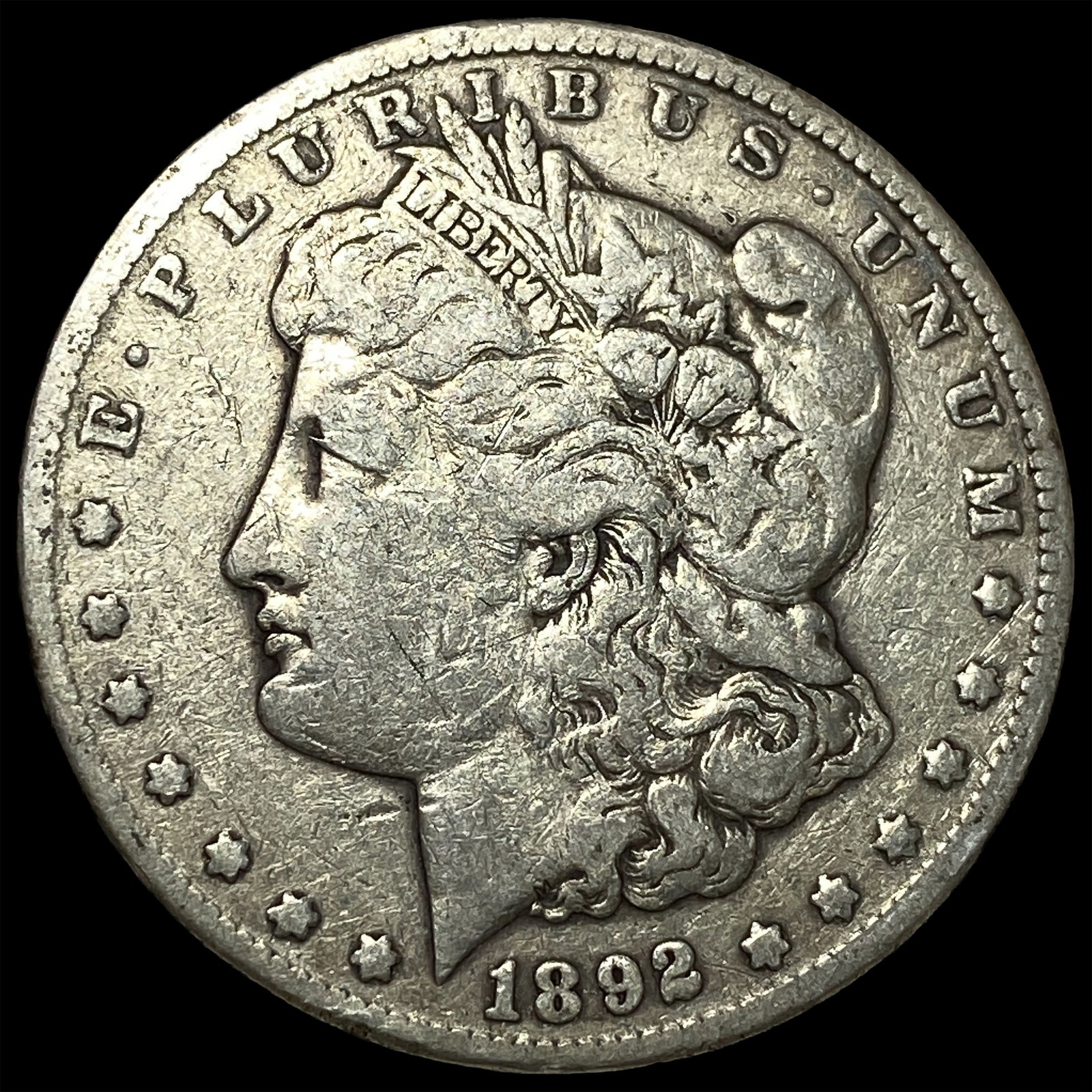 1892-CC Silver Morgan Dollar ABOUT UNCIRCULATED: 1892-CC Silver Morgan Dollar ABOUT UNCIRCULATED