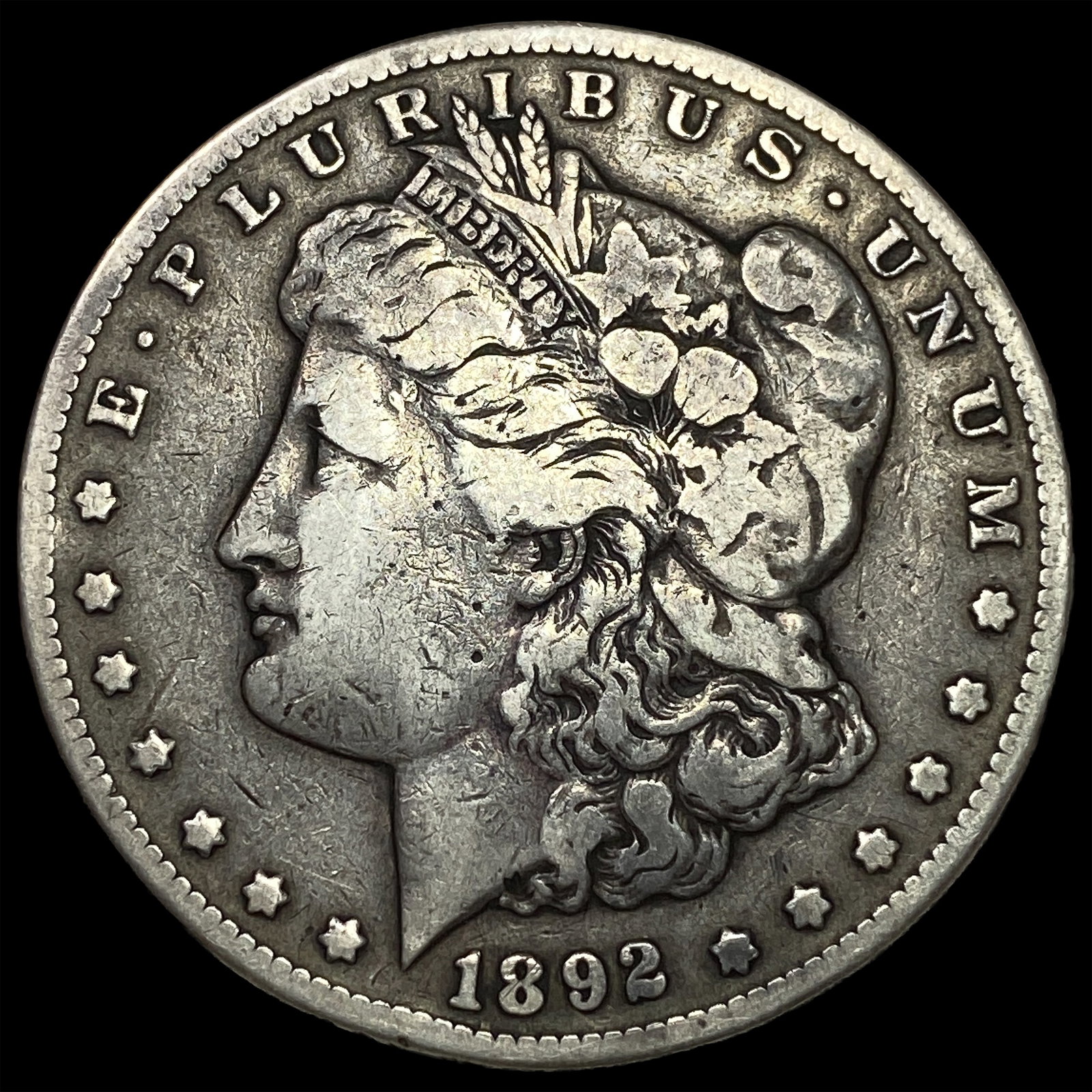 1892-CC Silver Morgan Dollar ABOUT UNCIRCULATED: 1892-CC Silver Morgan Dollar ABOUT UNCIRCULATED