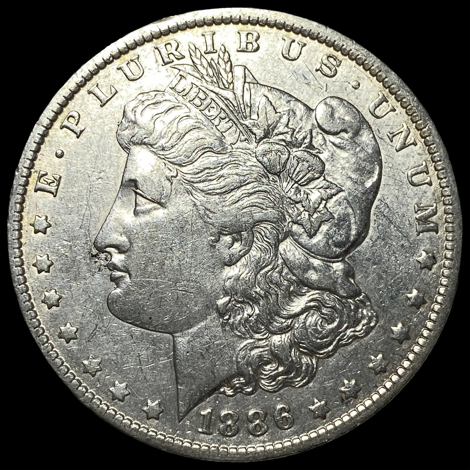1886-O Silver Morgan Dollar CLOSELY UNCIRCULATED: 1886-O Silver Morgan Dollar CLOSELY UNCIRCULATED