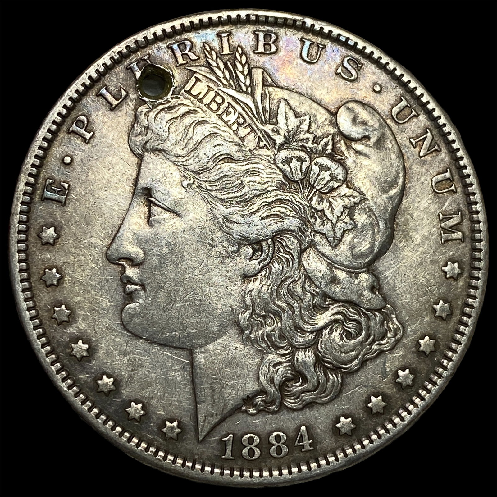 1884 Silver Morgan Dollar (holed). HIGH GRADE: 1884 Silver Morgan Dollar (holed). HIGH GRADE
