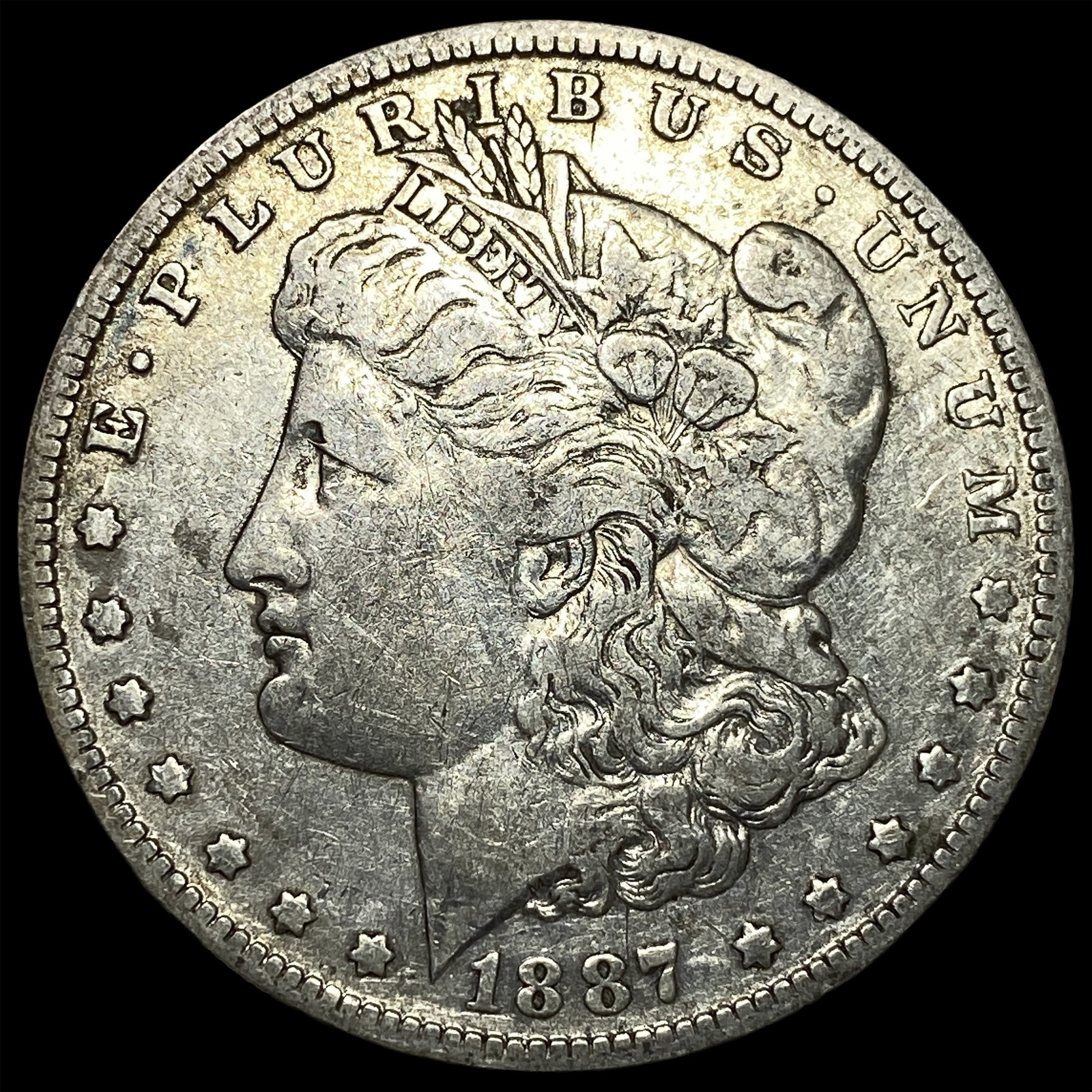 1887-O Silver Morgan Dollar NEARLY UNCIRCULATED: 1887-O Silver Morgan Dollar NEARLY UNCIRCULATED