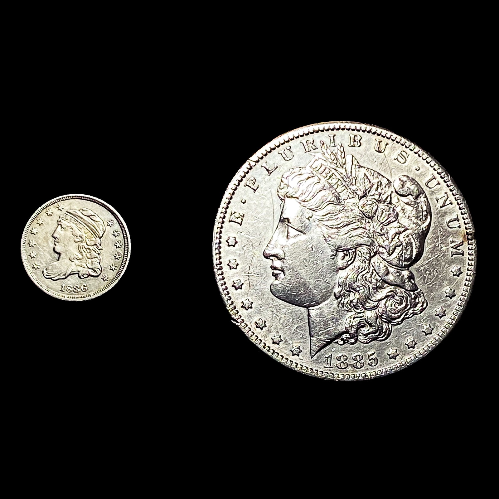 [2] 1836-1885 U.S. Silver Dollar and Half Dime Lot: [2] 1836-1885 U.S. Silver Dollar and Half Dime Lot
