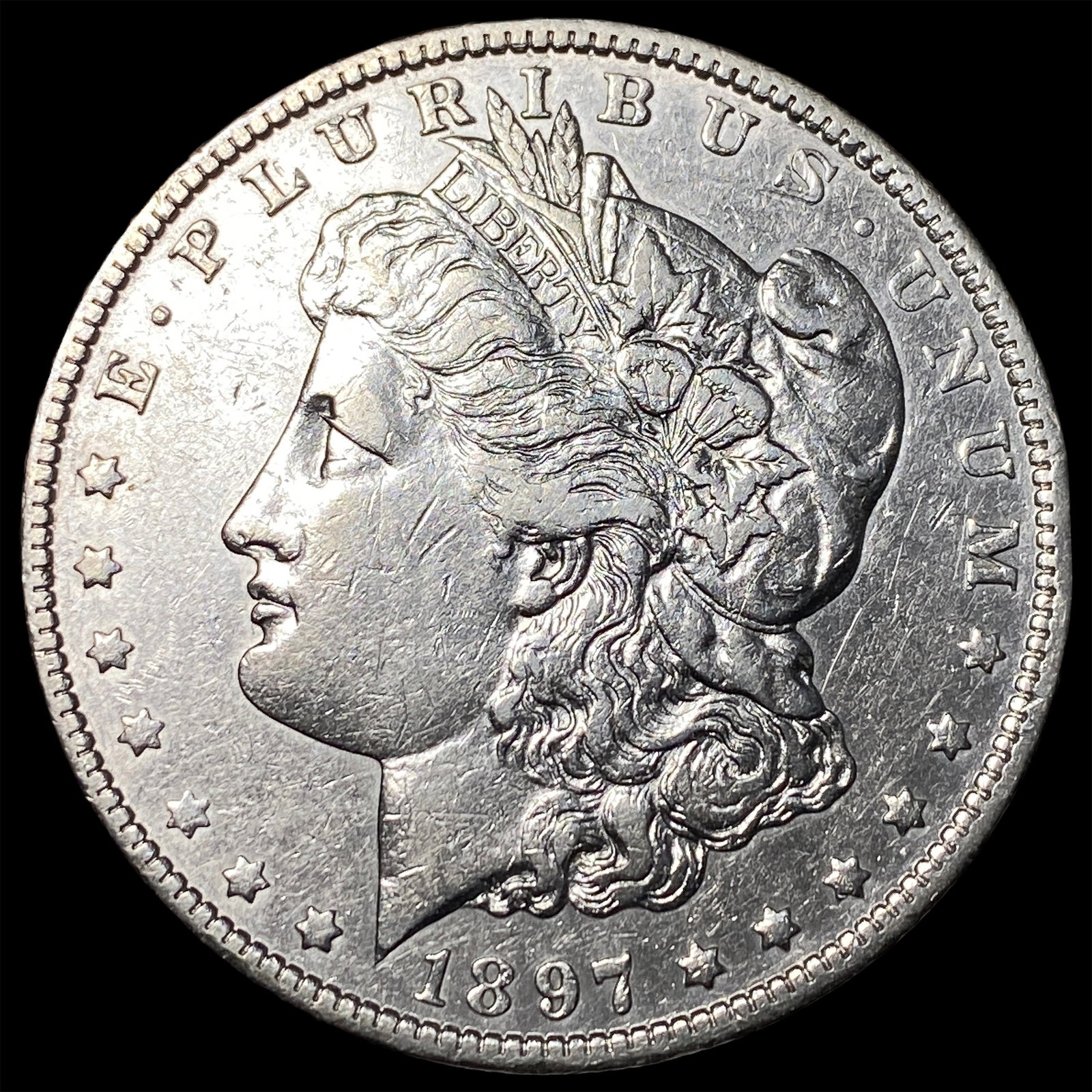 1897-O Morgan Silver Dollar ABOUT UNCIRCULATED: 1897-O Morgan Silver Dollar ABOUT UNCIRCULATED