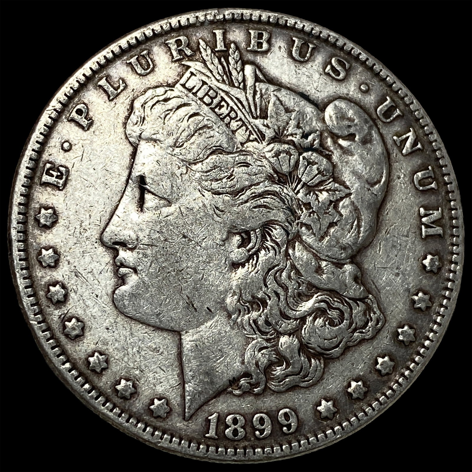 1899 Silver Morgan Dollar NEARLY UNCIRCULATED: 1899 Silver Morgan Dollar NEARLY UNCIRCULATED