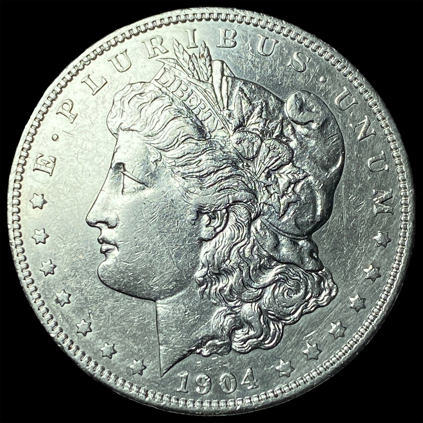 1904 Silver Morgan Dollar CLOSELY UNCIRCULATED: 1904 Silver Morgan Dollar CLOSELY UNCIRCULATED
