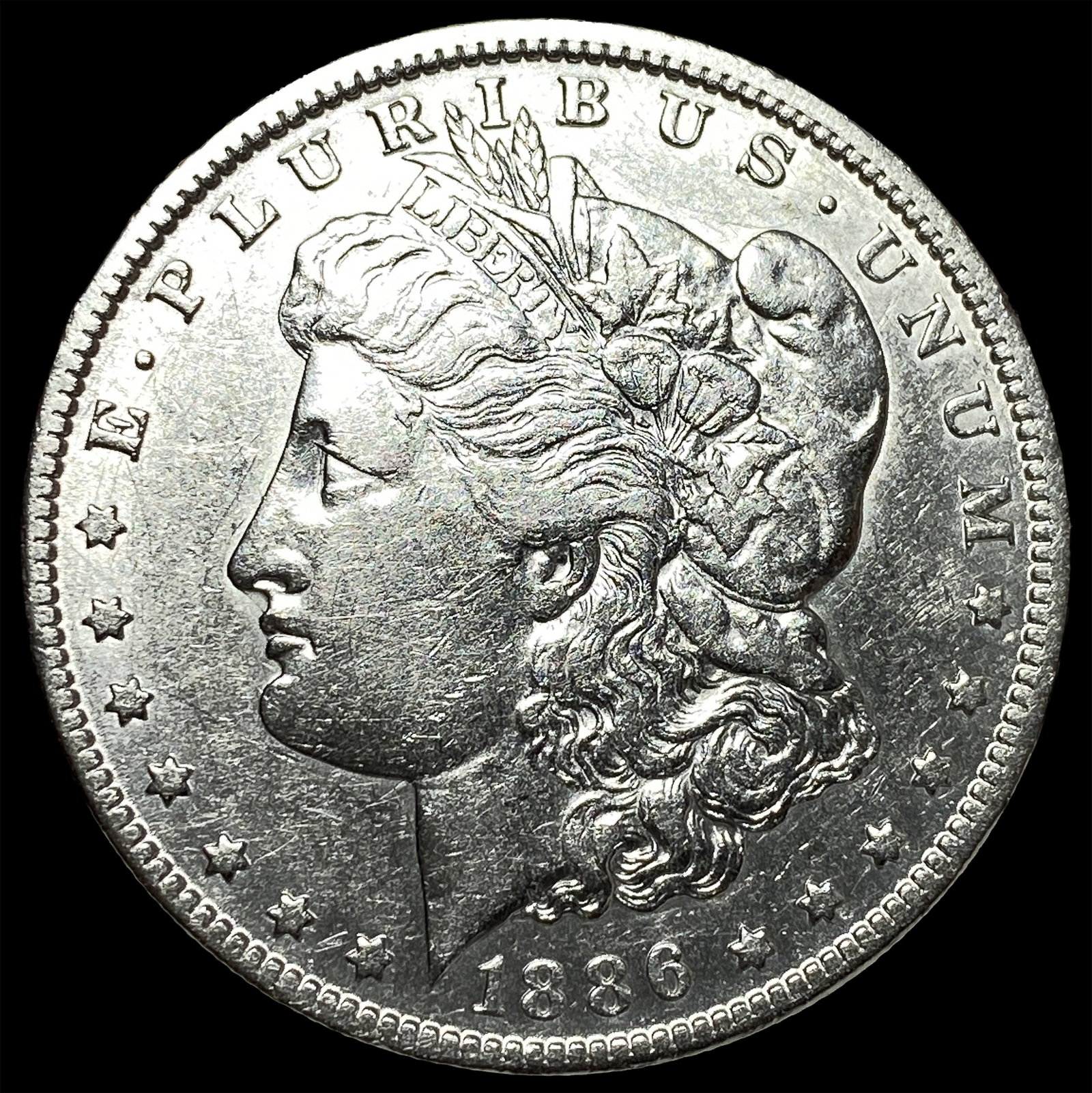 1886-O Silver Morgan Dollar CLOSELY UNCIRCULATED: 1886-O Silver Morgan Dollar CLOSELY UNCIRCULATED