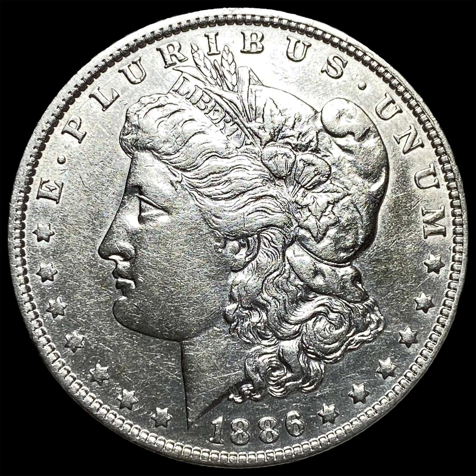 1886-O Silver Morgan Dollar CLOSELY UNCIRCULATED: 1886-O Silver Morgan Dollar CLOSELY UNCIRCULATED