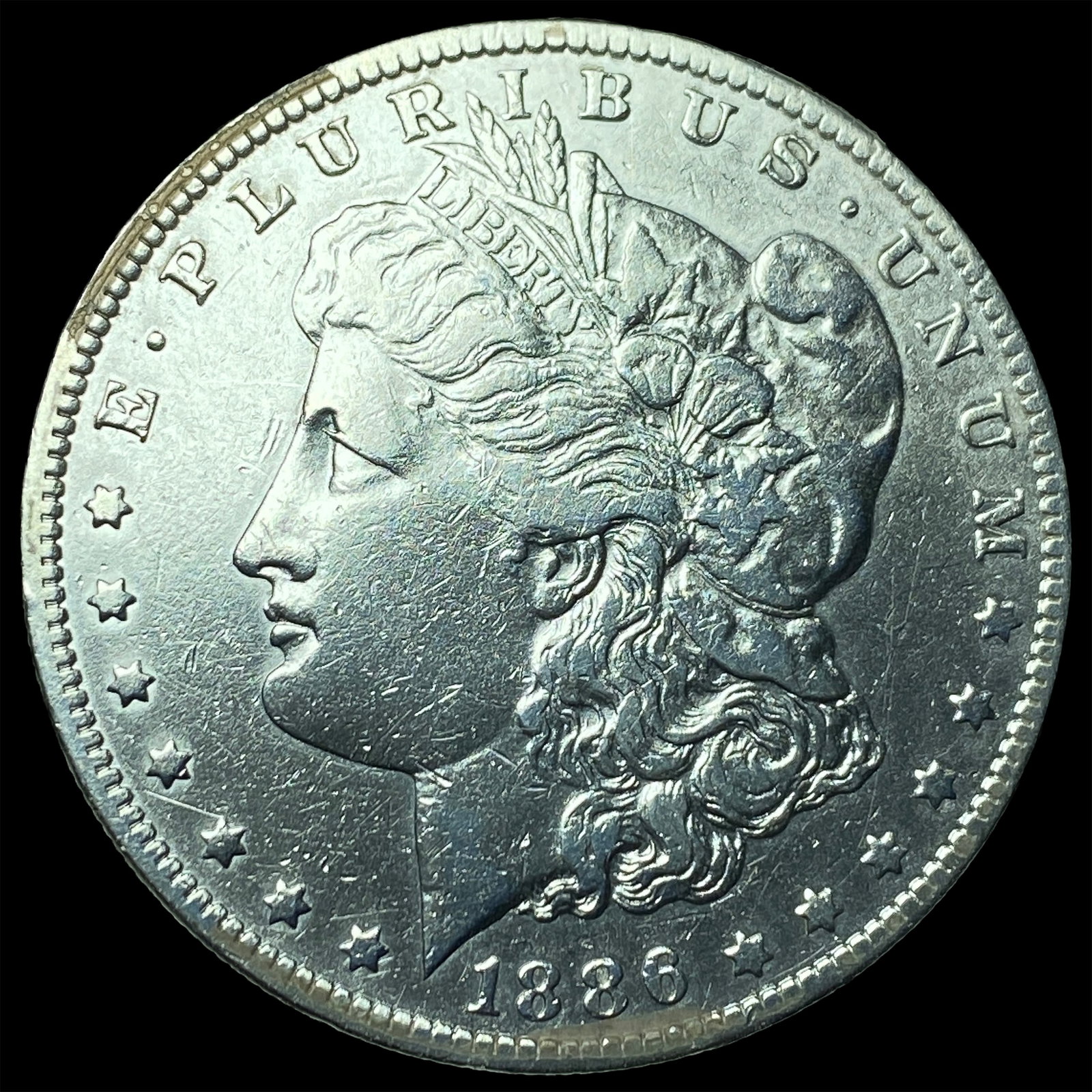 1886-O Silver Morgan Dollar CLOSELY UNCIRCULATED: 1886-O Silver Morgan Dollar CLOSELY UNCIRCULATED