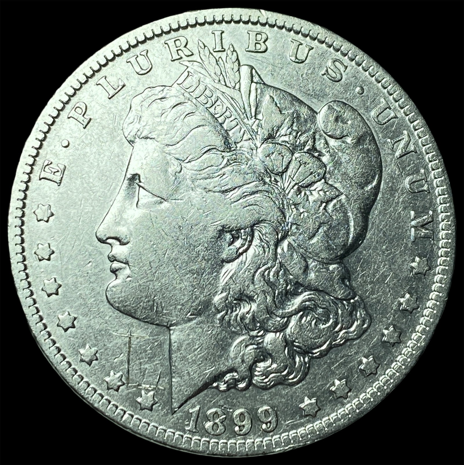 1899-O Silver Morgan Dollar CLOSELY UNCIRCULATED: 1899-O Silver Morgan Dollar CLOSELY UNCIRCULATED