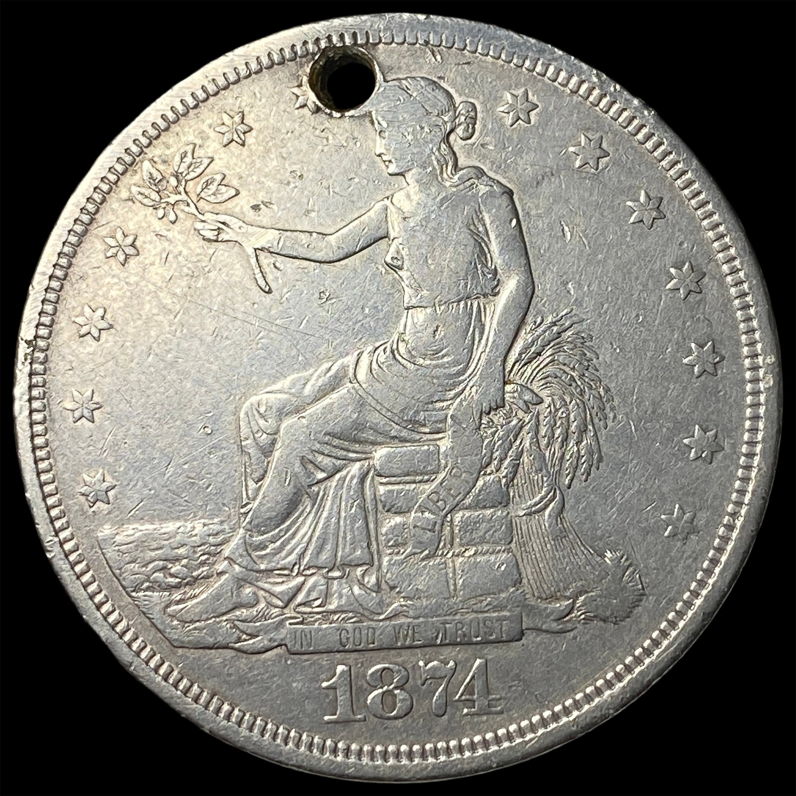 1874 Silver Trade Dollar (Holed) HIGH GRADE: 1874 Silver Trade Dollar (Holed) HIGH GRADE