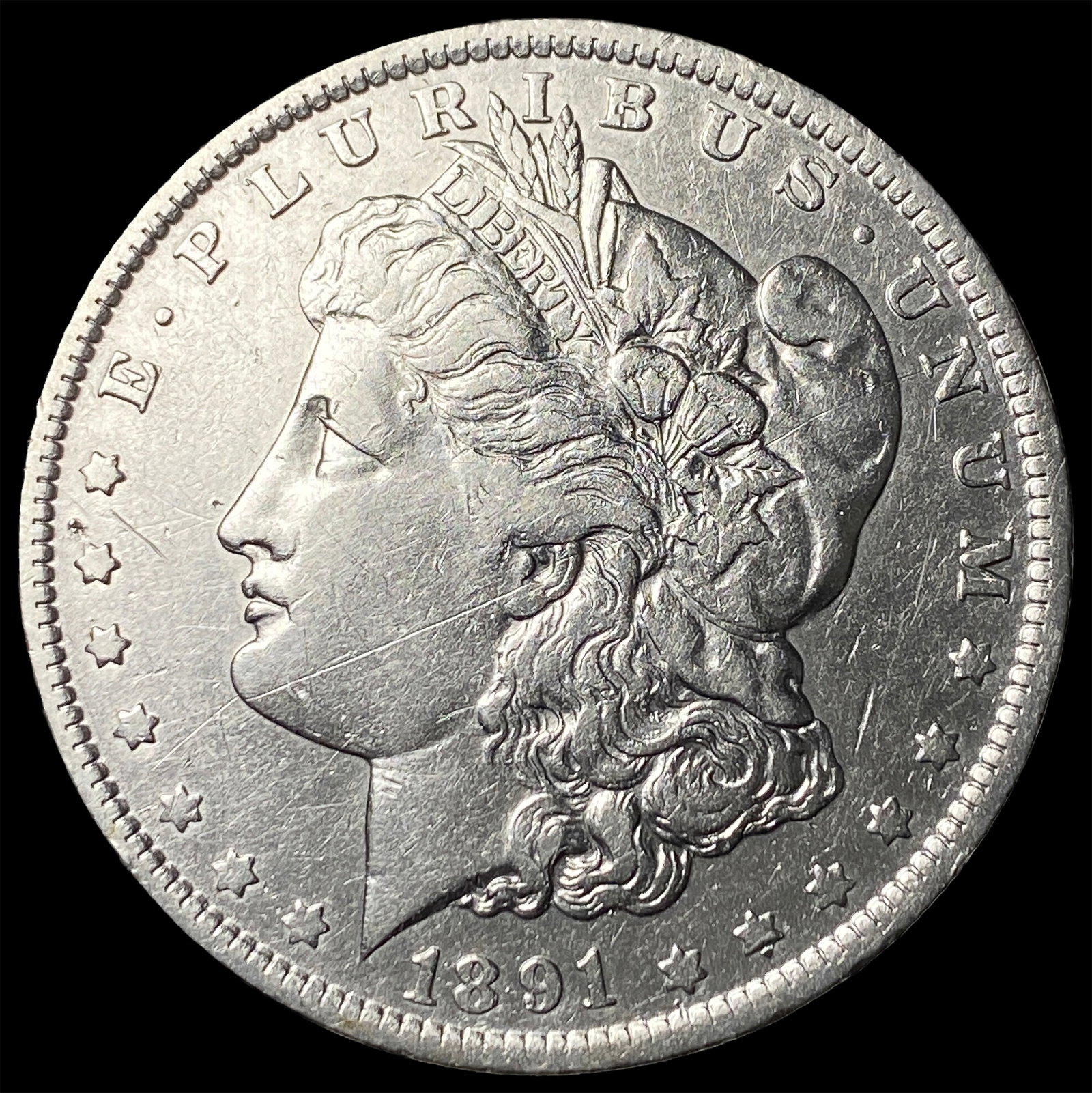 1891-O Silver Morgan Dollar CLOSELY UNCIRCULATED (1 of 2)