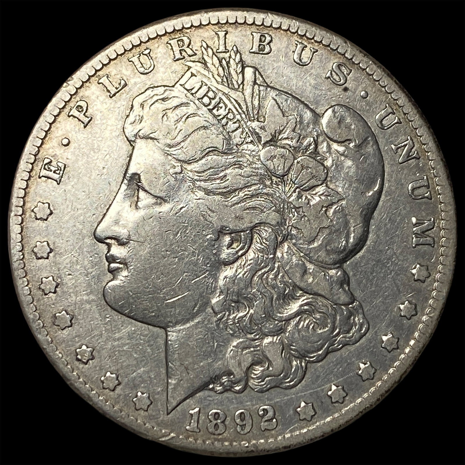 1892-CC Silver Morgan Dollar NEARLY UNCIRCULATED: 1892-CC Silver Morgan Dollar NEARLY UNCIRCULATED