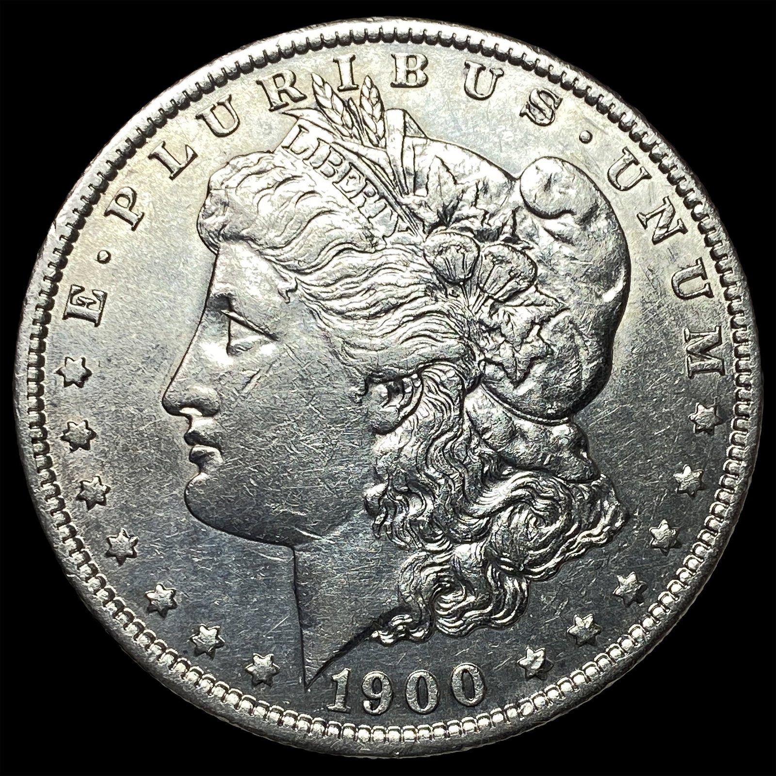 1900-O/CC Silver Morgan Dollar ABOUT UNCIRCULATED: 1900-O/CC Silver Morgan Dollar ABOUT UNCIRCULATED