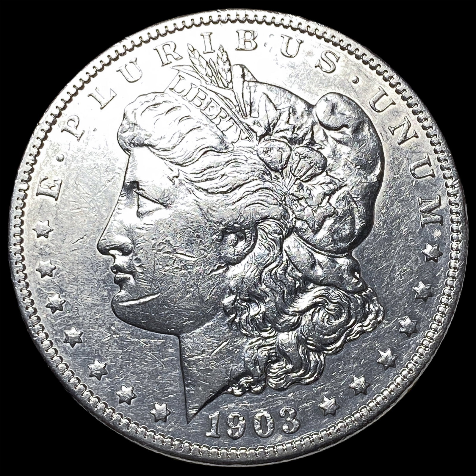 1903-O Silver Morgan Dollar NEARLY UNCIRCULATED (1 of 2)