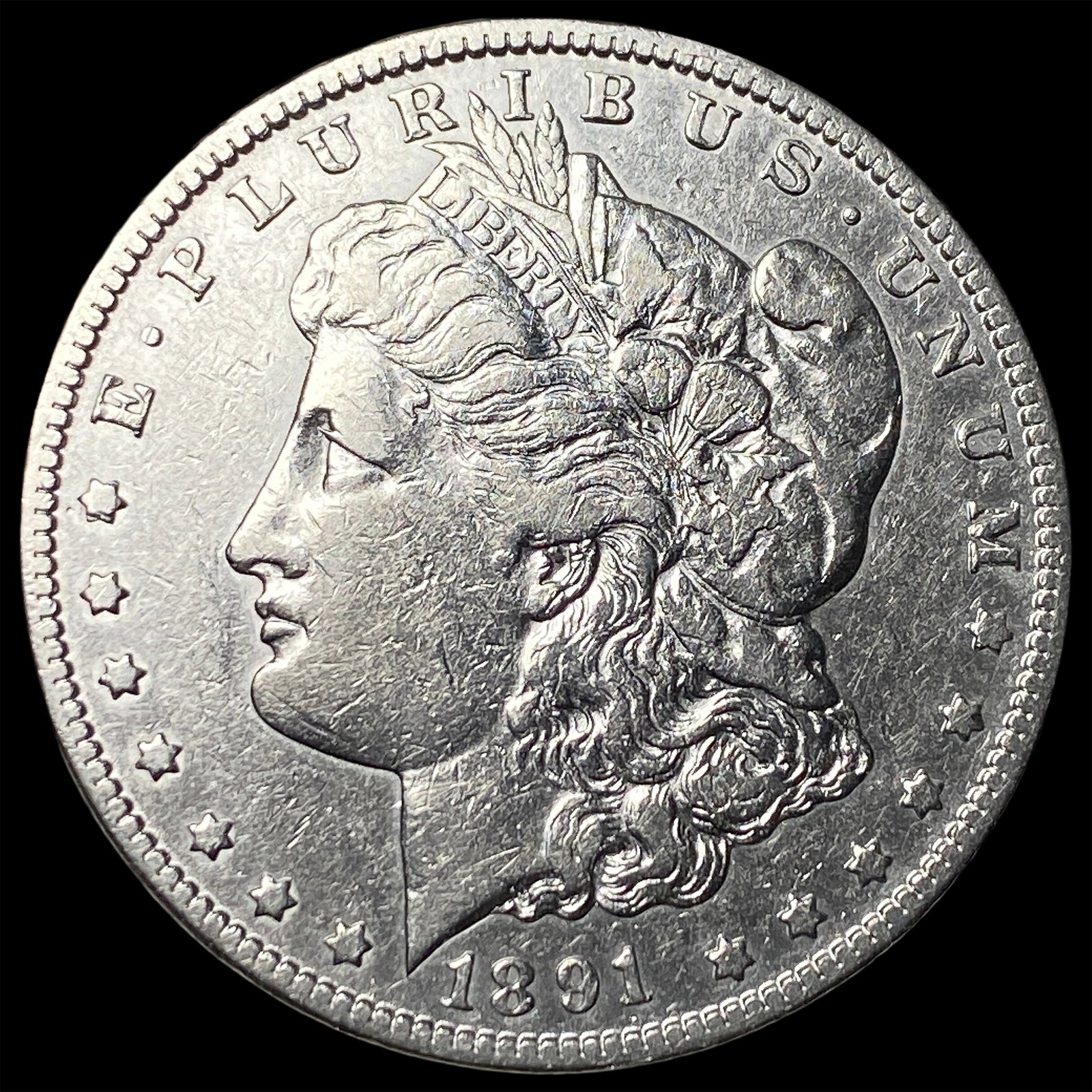 1891-CC Silver Morgan Dollar CLOSELY UNCIRCULATED: 1891-CC Silver Morgan Dollar CLOSELY UNCIRCULATED