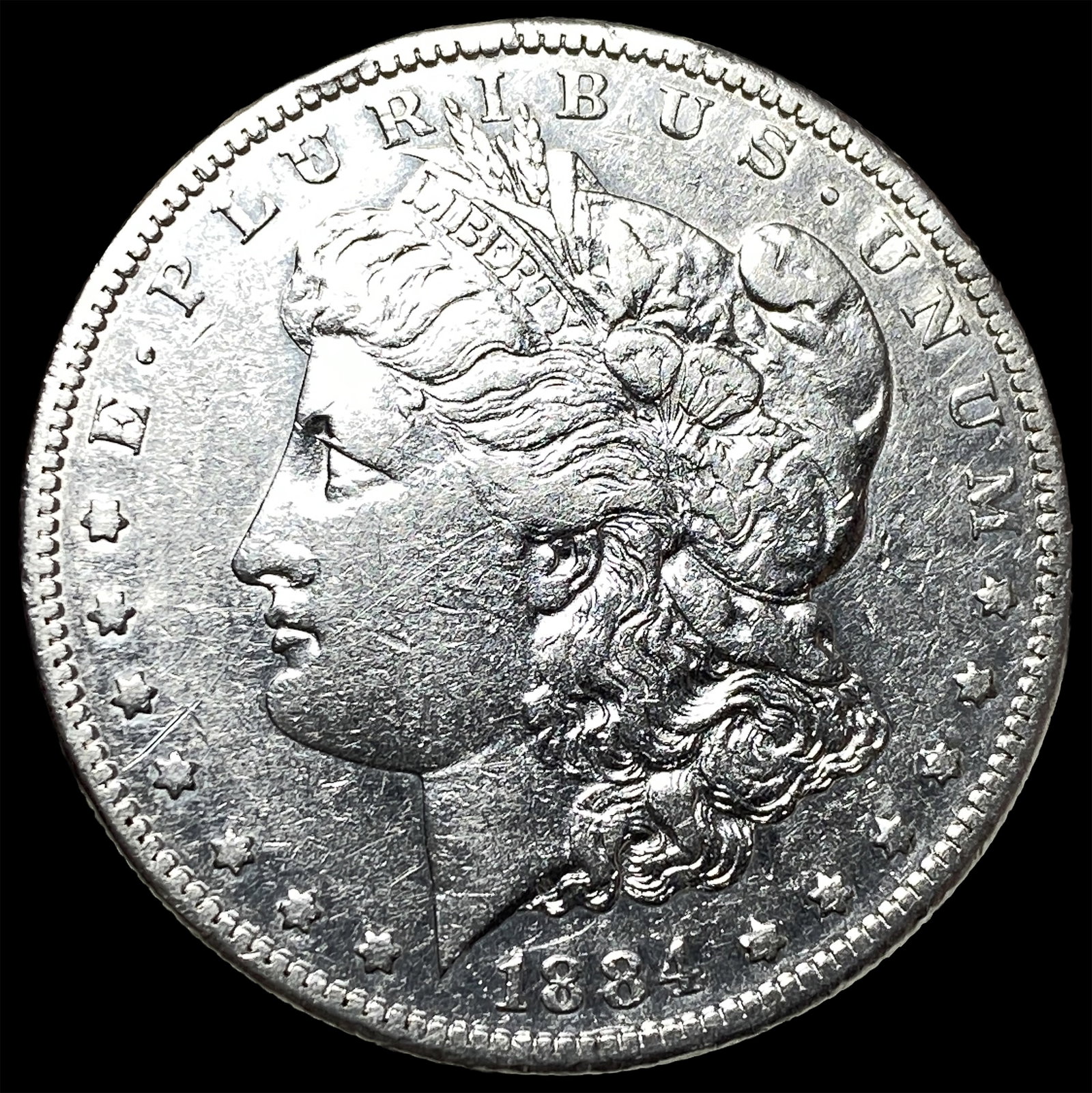 1884 Morgan Silver Dollar ABOUT UNCIRCULATED: 1884 Morgan Silver Dollar ABOUT UNCIRCULATED