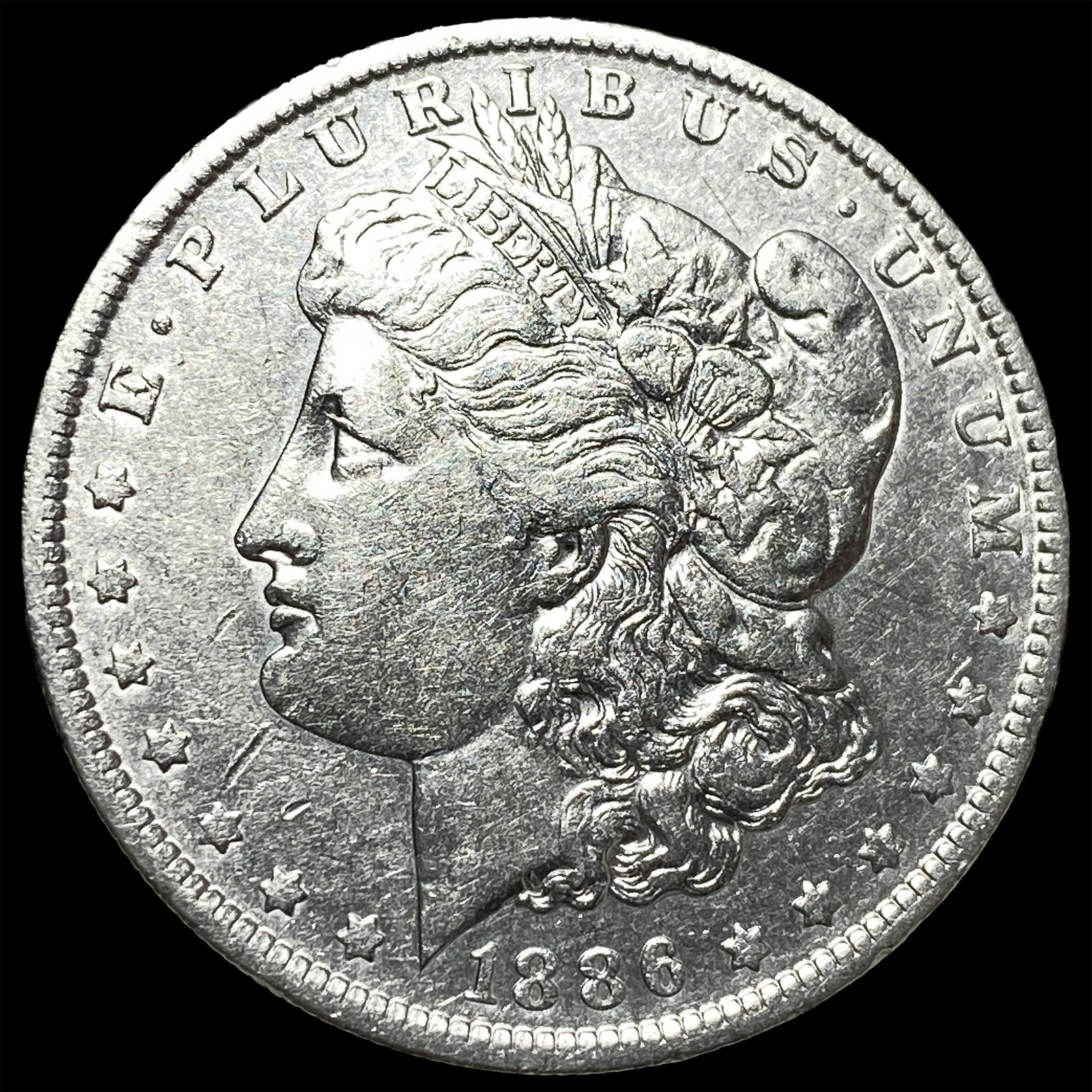 1886-O Silver Morgan Dollar NEARLY UNCIRCULATED: 1886-O Silver Morgan Dollar NEARLY UNCIRCULATED
