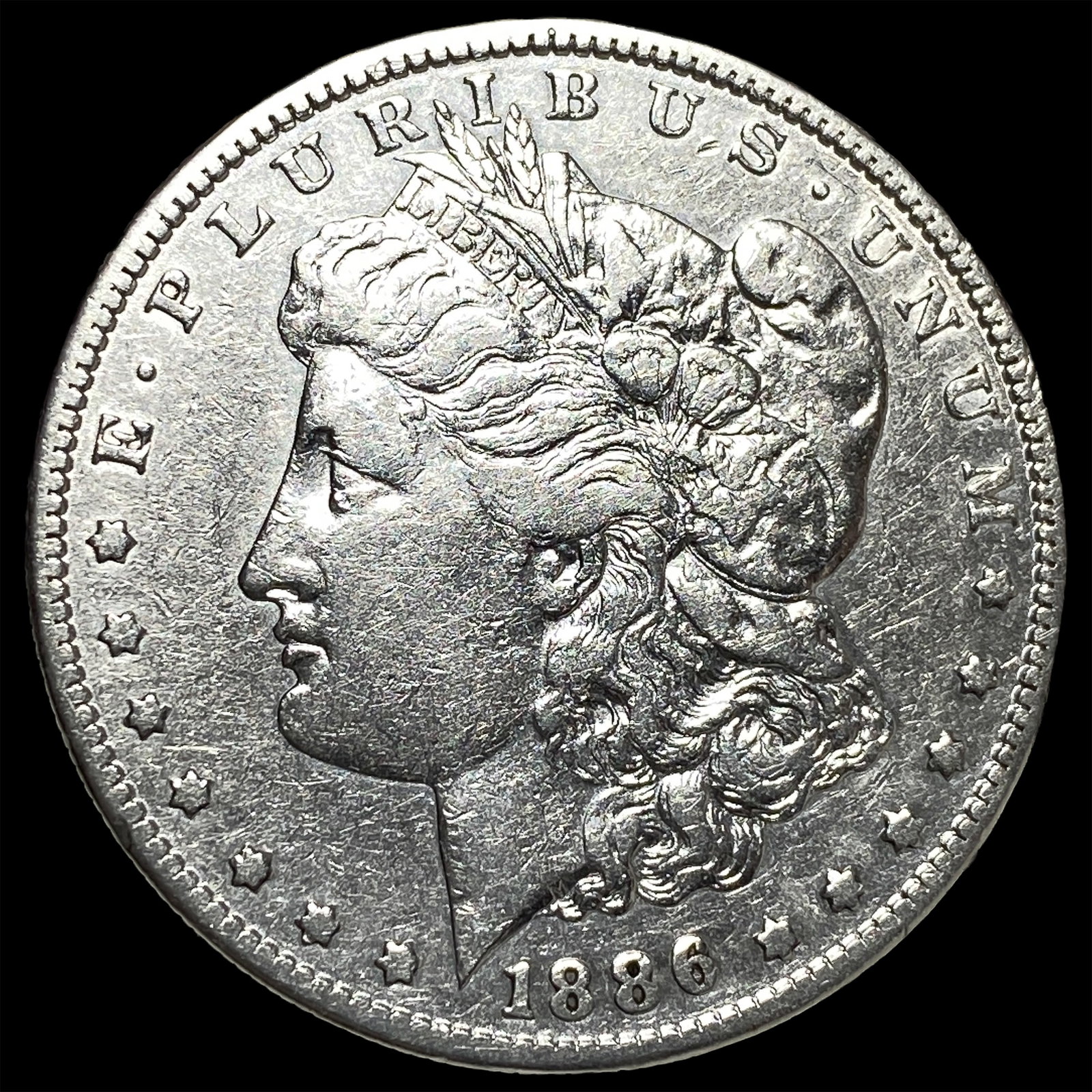 1886 Morgan Silver Dollar NEARLY UNCIRCULATED: 1886 Morgan Silver Dollar NEARLY UNCIRCULATED