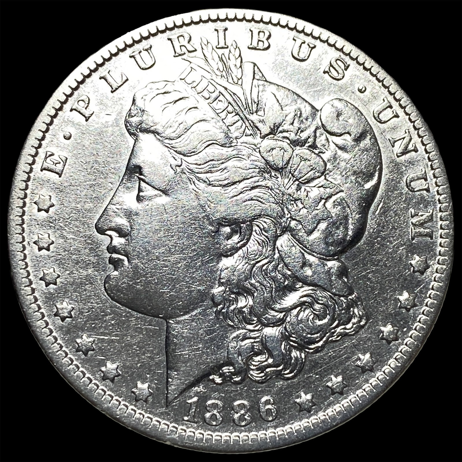 1886-O Morgan Silver Dollar CLOSELY UNCIRCULATED: 1886-O Morgan Silver Dollar CLOSELY UNCIRCULATED