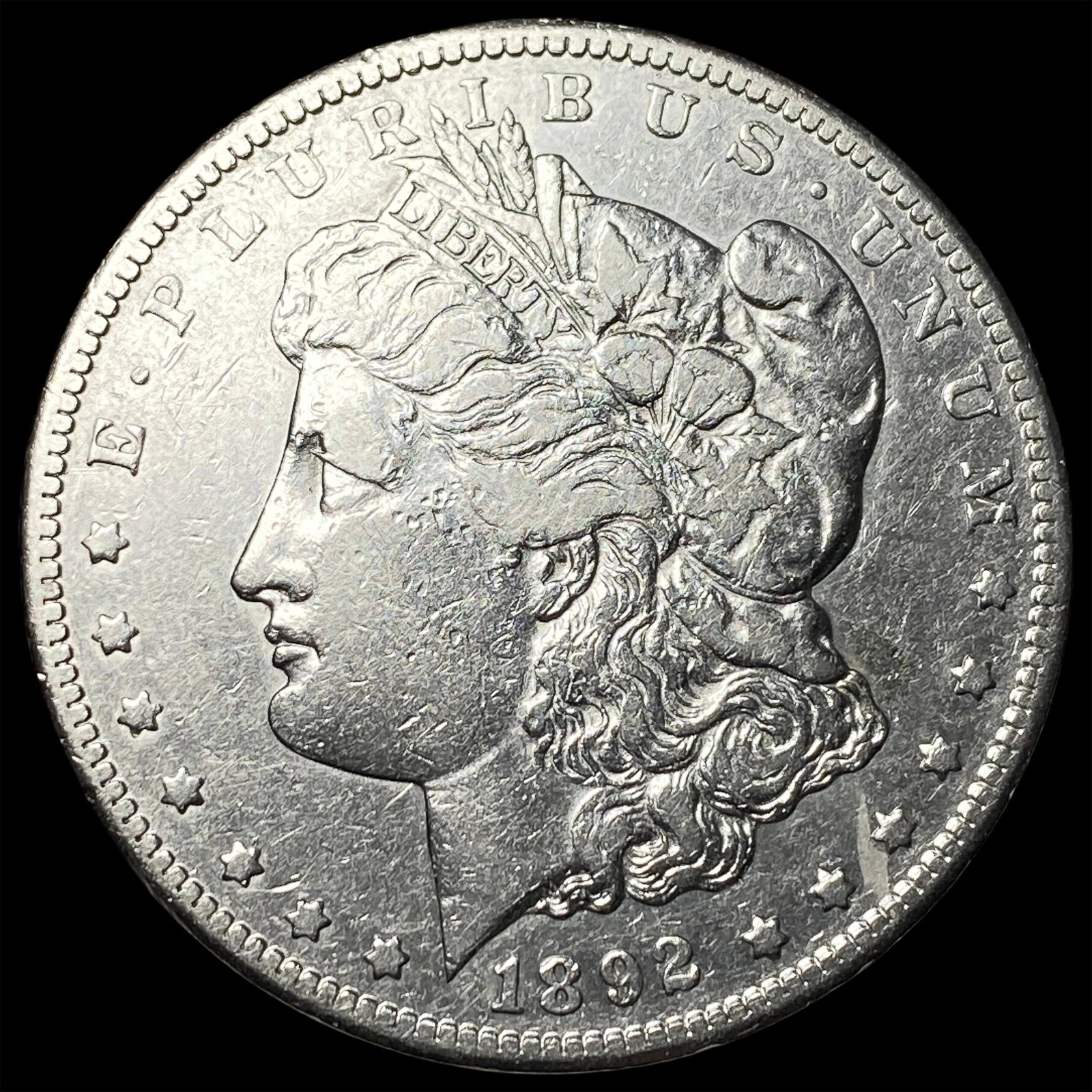 1892-CC Silver Morgan Dollar CLOSELY UNCIRCULATED: 1892-CC Silver Morgan Dollar CLOSELY UNCIRCULATED