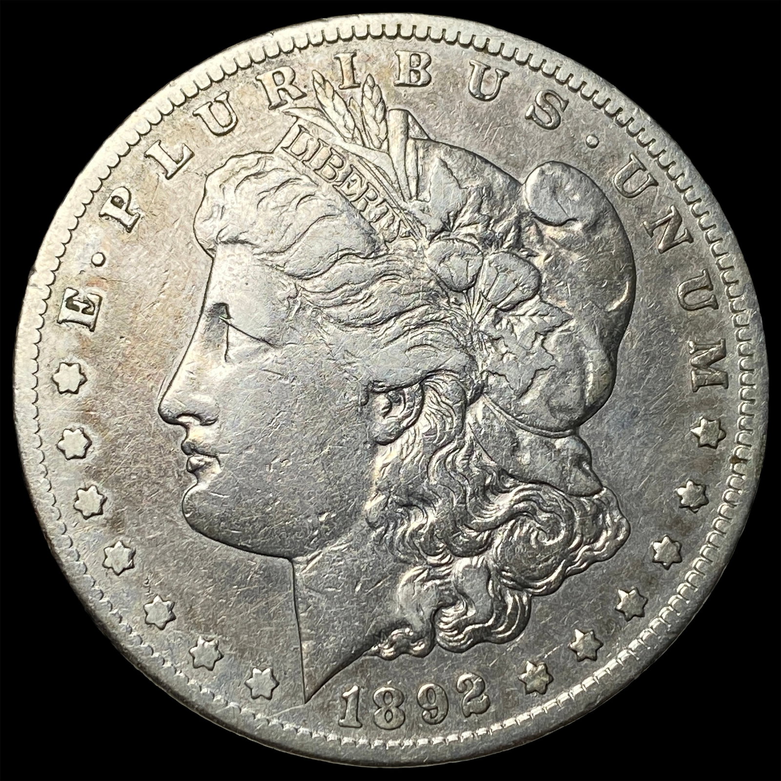 1892-CC Silver Morgan Dollar NEARLY UNCIRCULATED: 1892-CC Silver Morgan Dollar NEARLY UNCIRCULATED