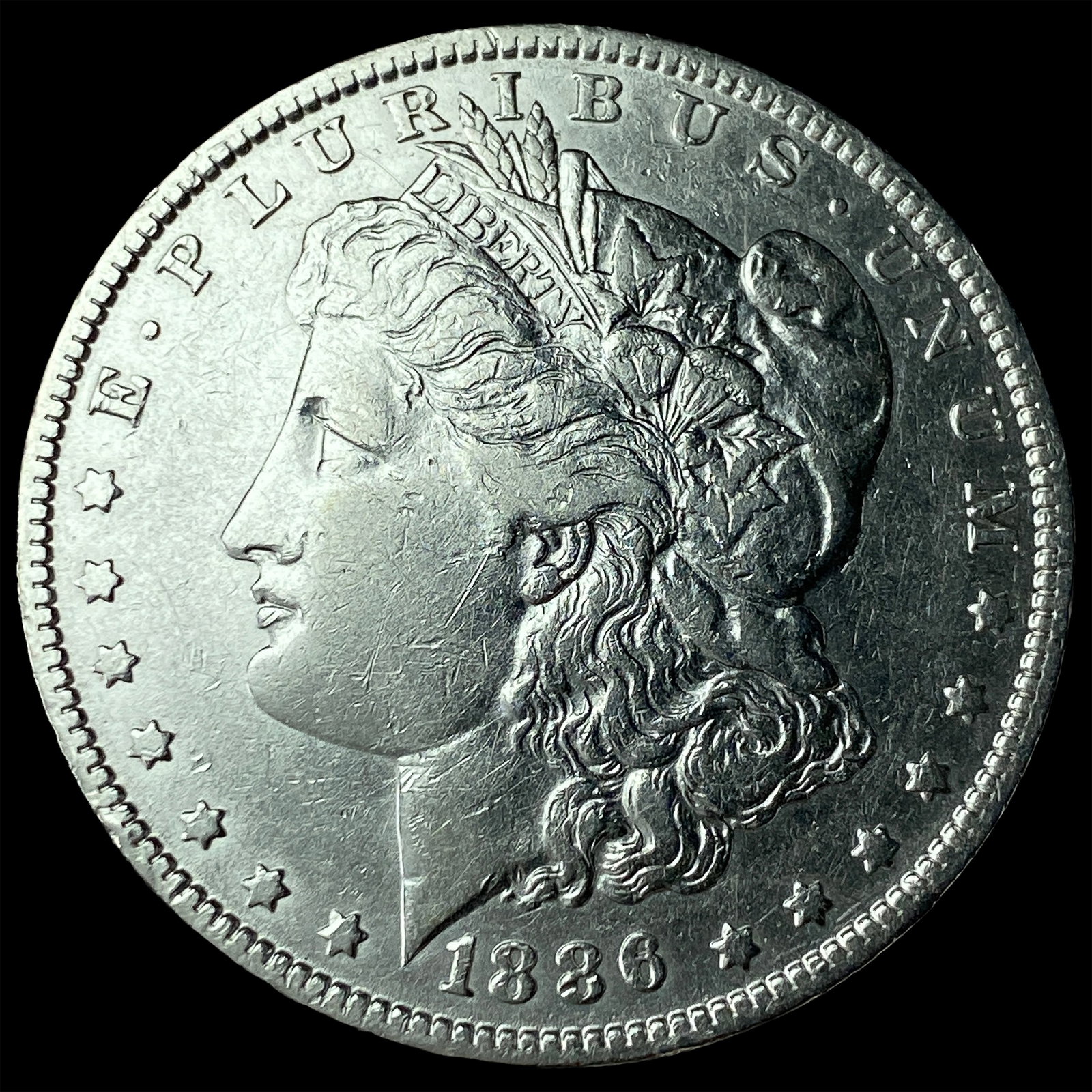 1886-O Silver Morgan Dollar CLOSELY UNCIRCULATED: 1886-O Silver Morgan Dollar CLOSELY UNCIRCULATED