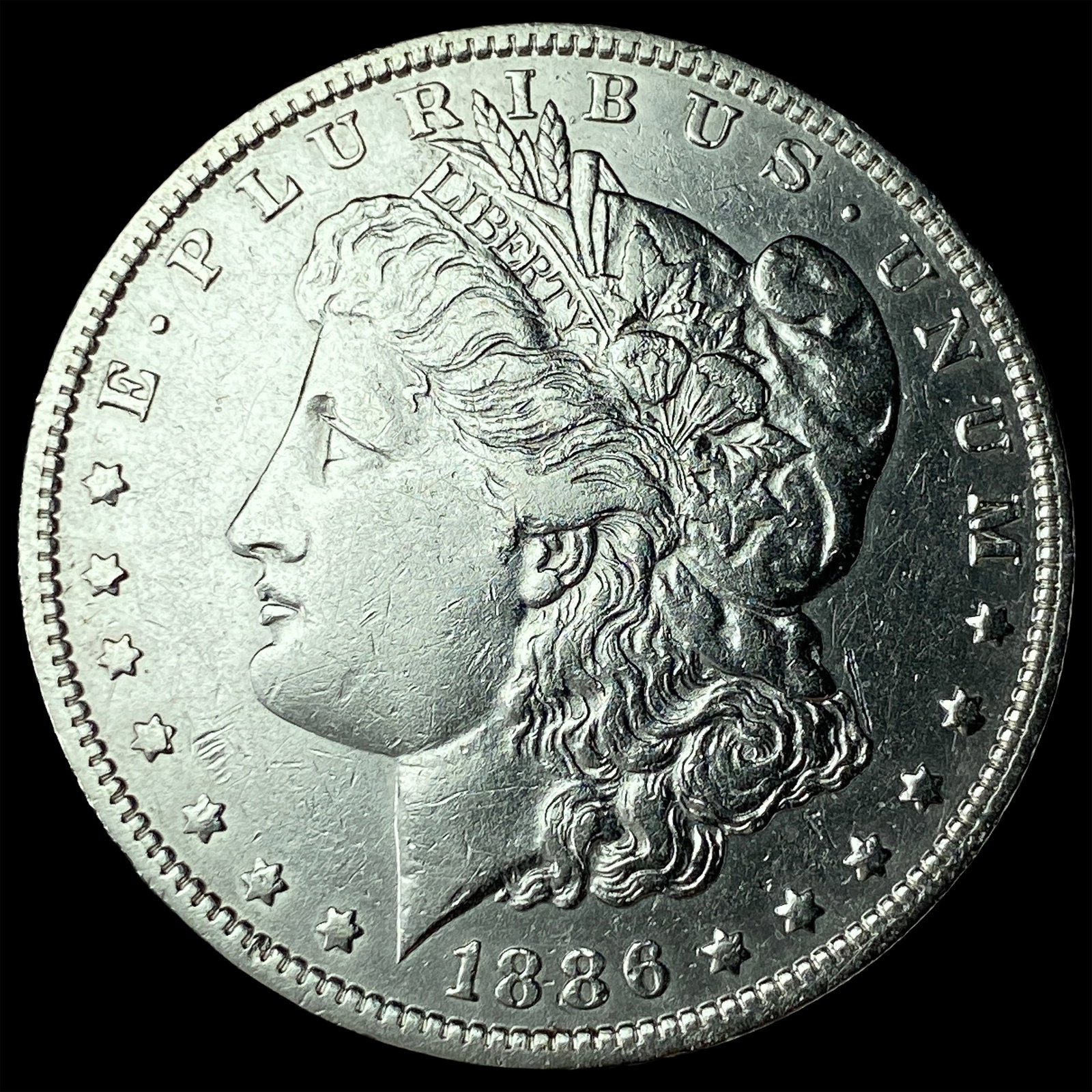 1886-O Silver Morgan Dollar CLOSELY UNCIRCULATED: 1886-O Silver Morgan Dollar CLOSELY UNCIRCULATED