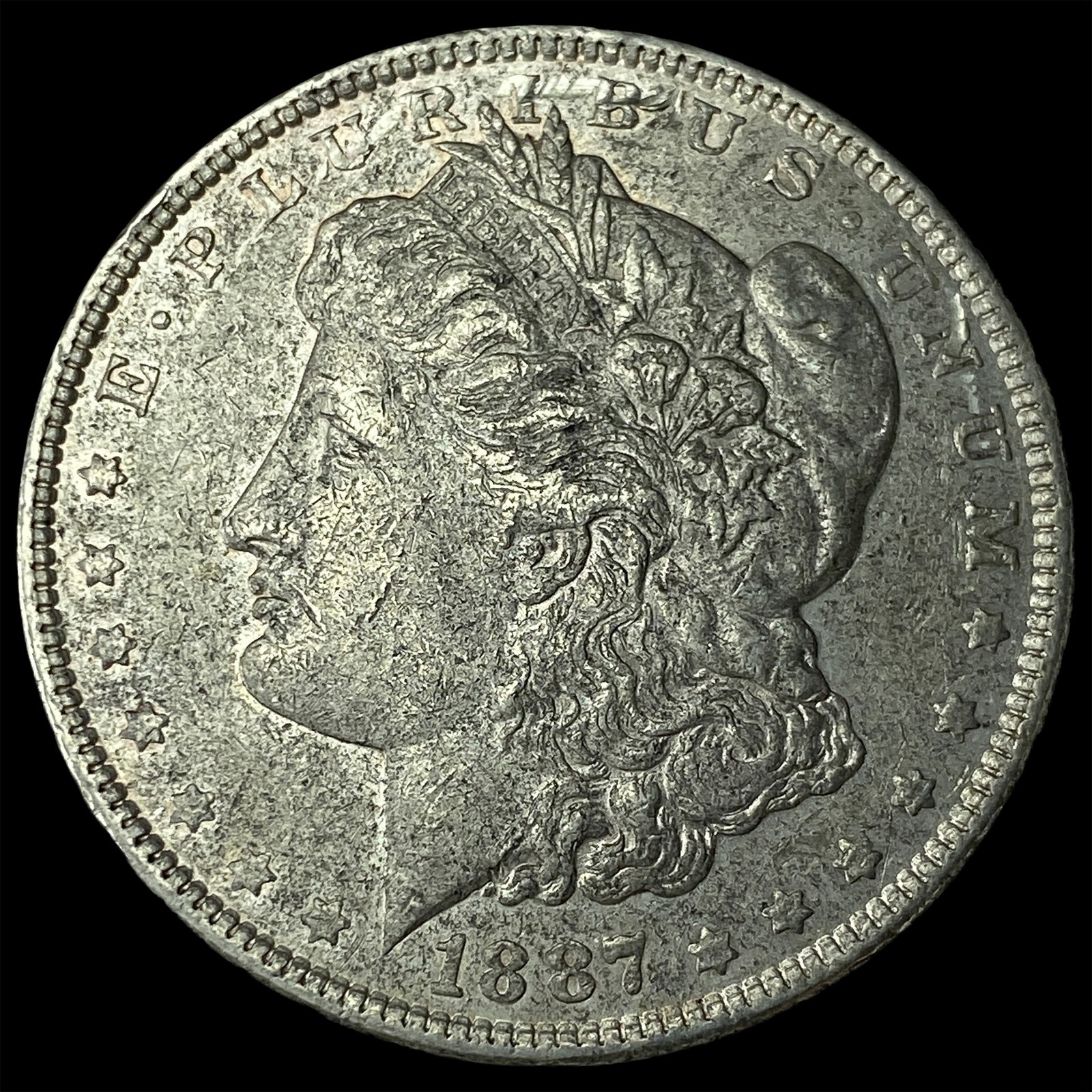 1887 Silver Morgan Dollar CLOSELY UNCIRCULATED: 1887 Silver Morgan Dollar CLOSELY UNCIRCULATED