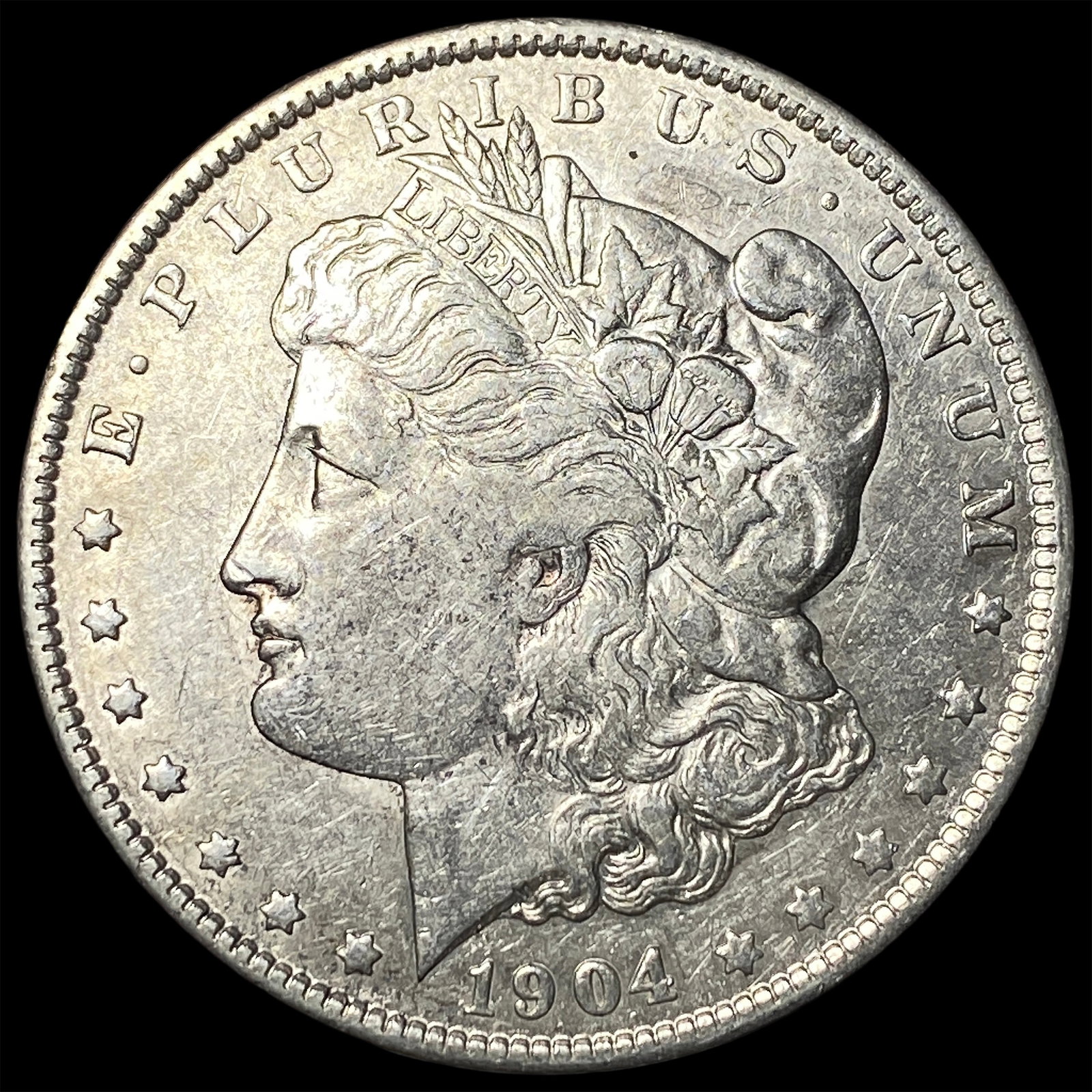 1904-O Silver Morgan Dollar CLOSELY UNCIRCULATED: 1904-O Silver Morgan Dollar CLOSELY UNCIRCULATED