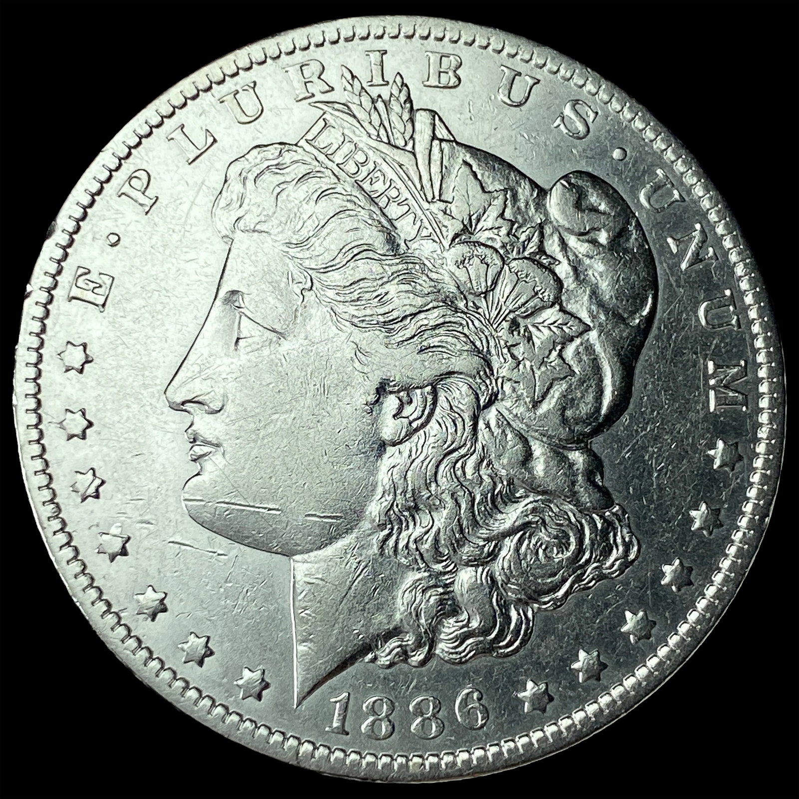 1886-O Silver Morgan Dollar CLOSELY UNCIRCULATED: 1886-O Silver Morgan Dollar CLOSELY UNCIRCULATED
