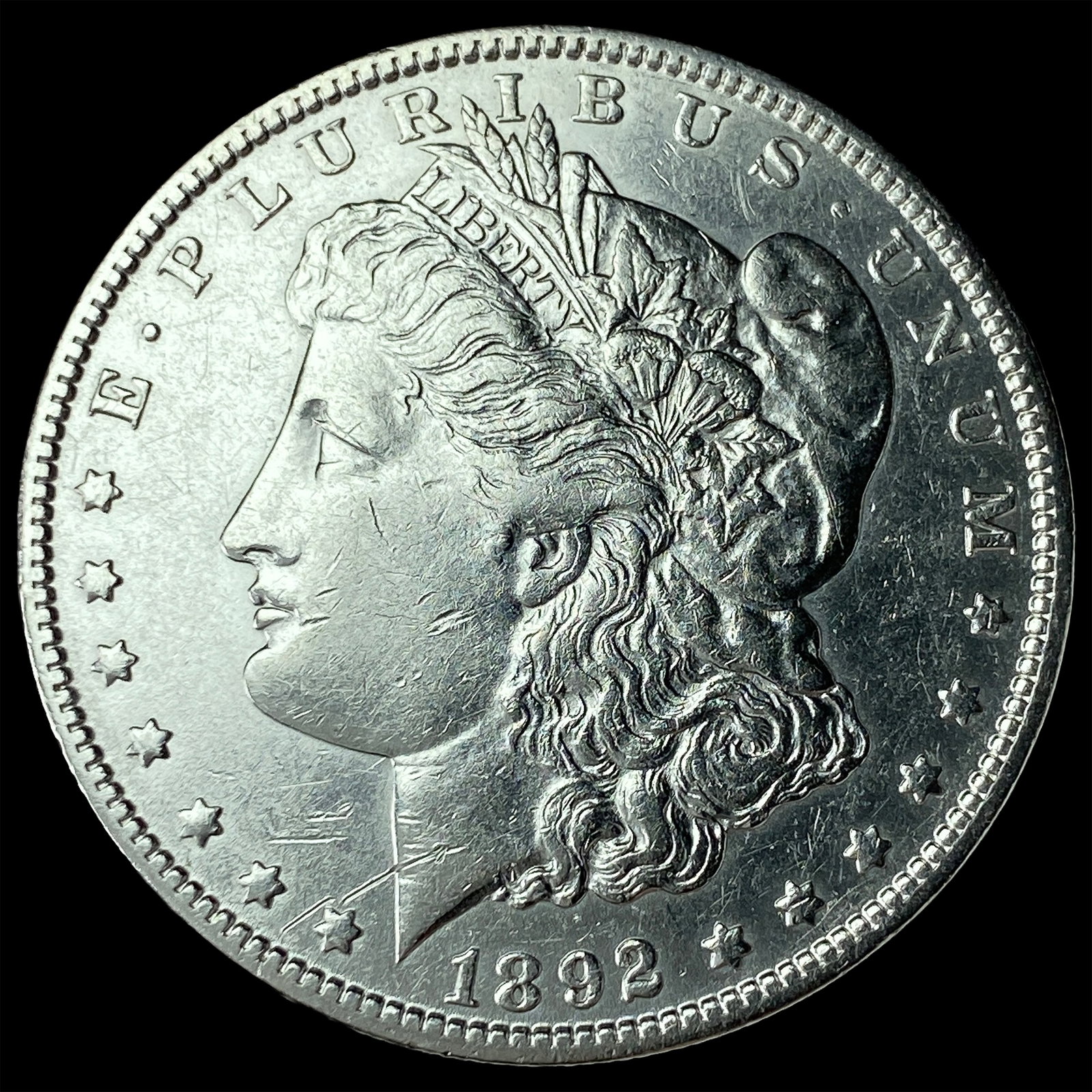 1892-O Silver Morgan Dollar CLOSELY UNCIRCULATED (1 of 2)