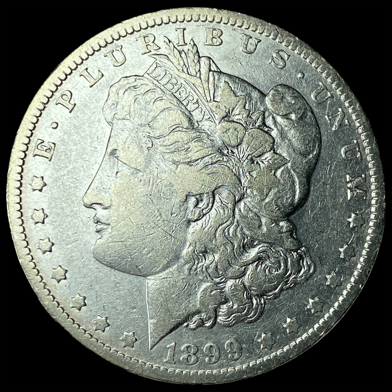 1899-O Silver Morgan Dollar NEARLY UNCIRCULATED: 1899-O Silver Morgan Dollar NEARLY UNCIRCULATED