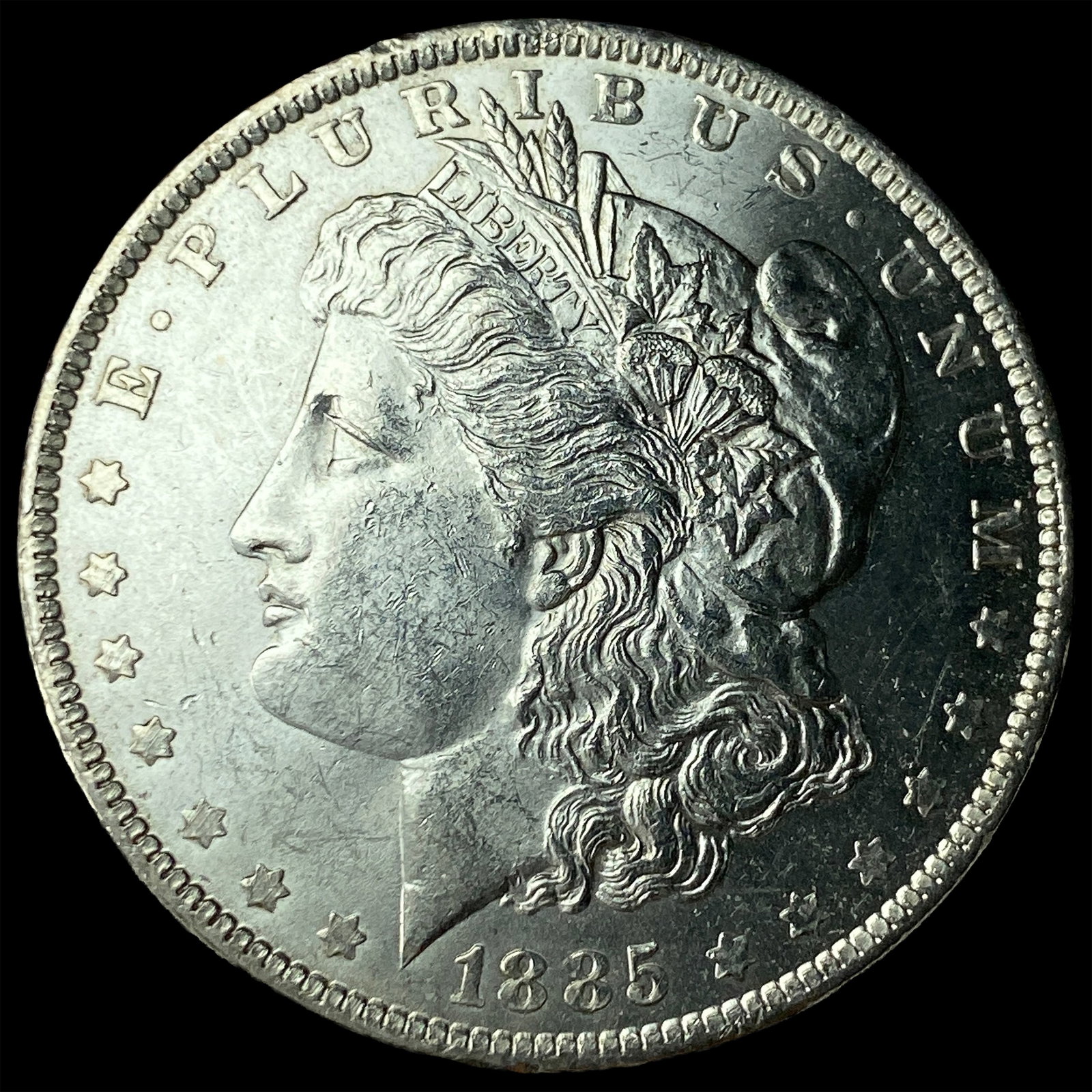 1885-O Silver Morgan Dollar CLOSELY UNCIRCULATED (1 of 2)