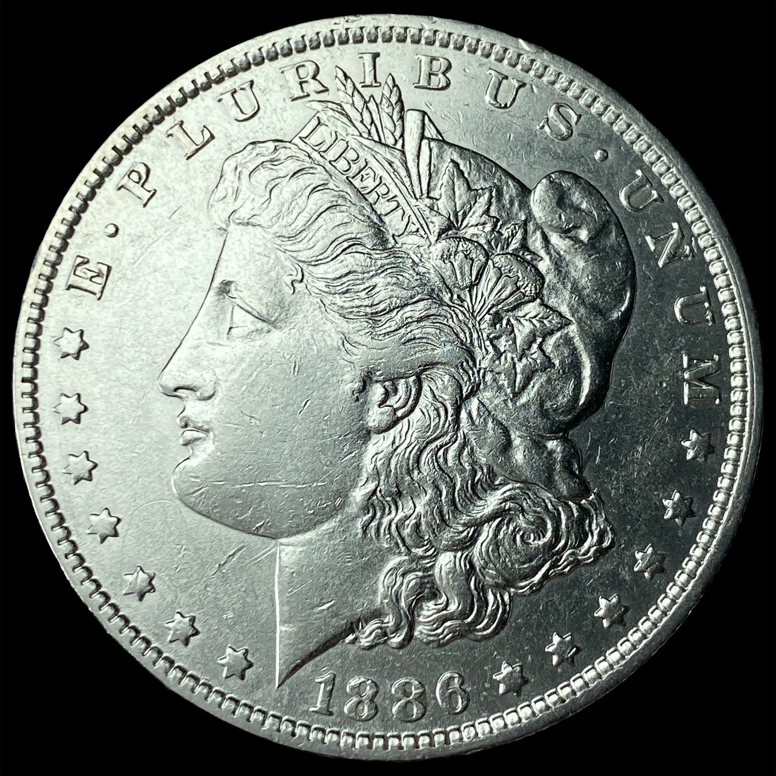 1886-O Silver Morgan Dollar CLOSELY UNCIRCULATED: 1886-O Silver Morgan Dollar CLOSELY UNCIRCULATED