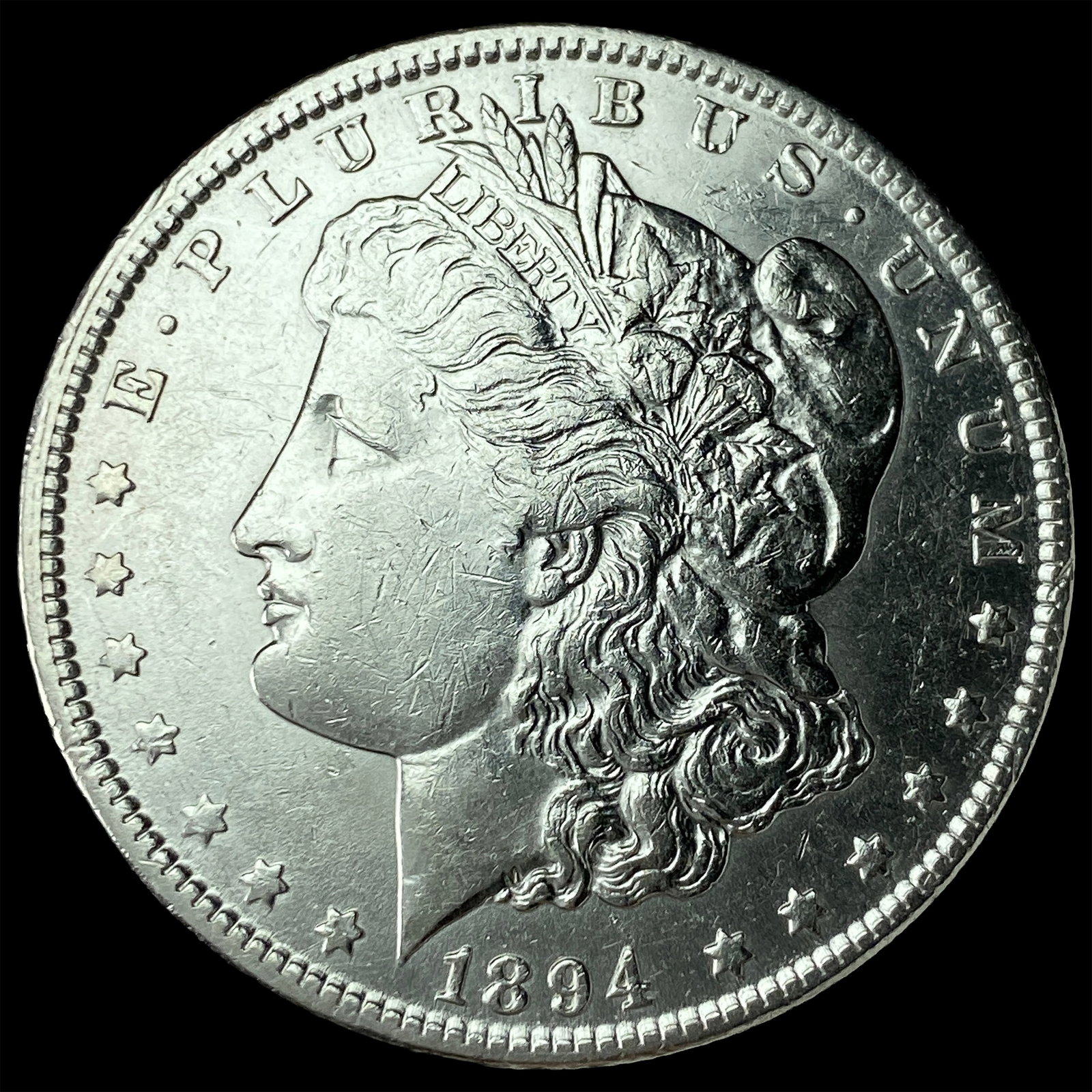 1894-O Silver Morgan Dollar ABOUT UNCIRCULATED: 1894-O Silver Morgan Dollar ABOUT UNCIRCULATED
