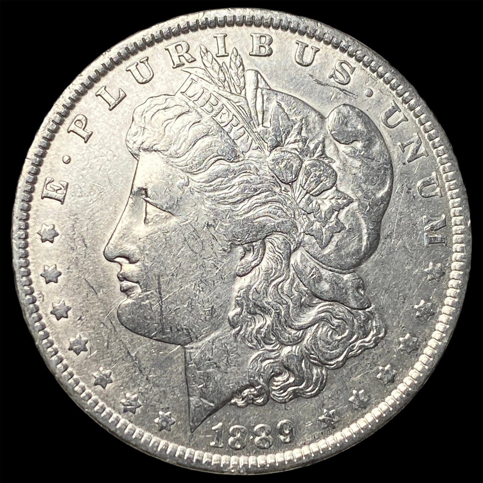 1889 Morgan Silver Dollar CLOSELY UNCIRCULATED (1 of 2)
