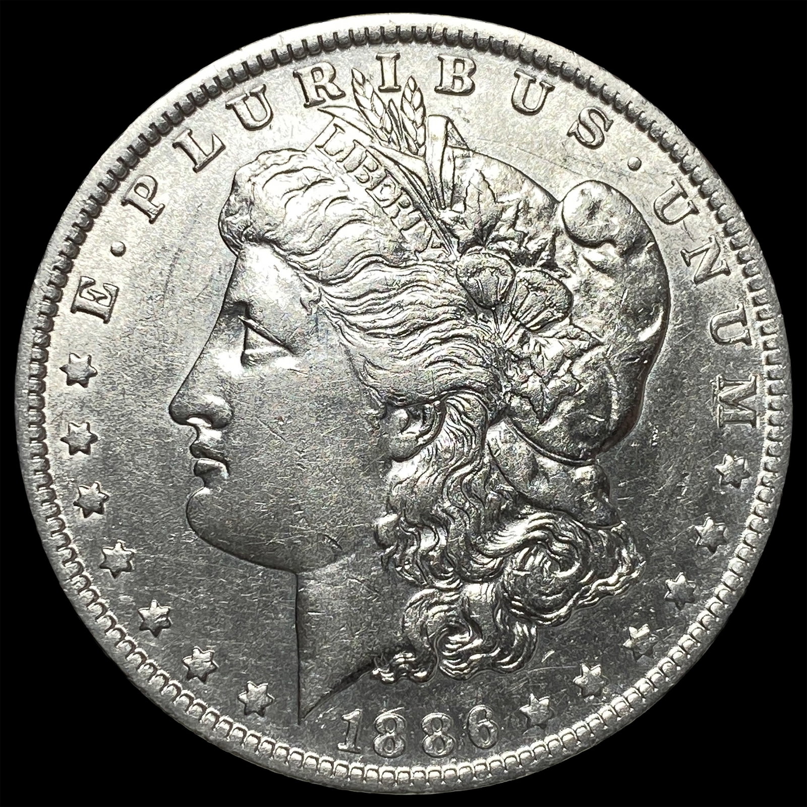 1886-O Silver Morgan Dollar CLOSELY UNCIRCULATED: 1886-O Silver Morgan Dollar CLOSELY UNCIRCULATED
