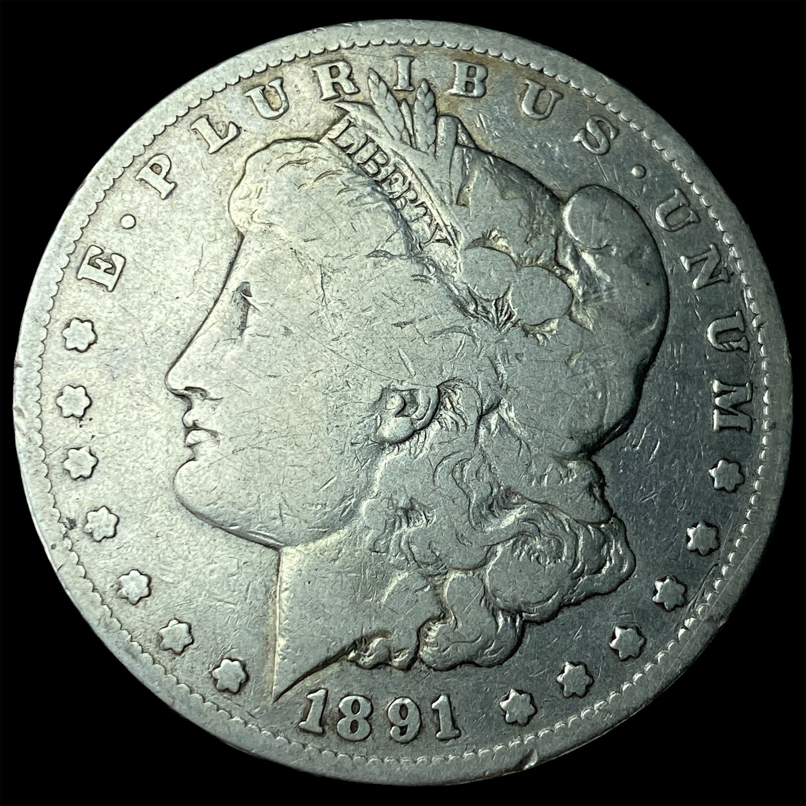 1891-CC Silver Morgan Dollar ABOUT UNCIRCULATED: 1891-CC Silver Morgan Dollar ABOUT UNCIRCULATED
